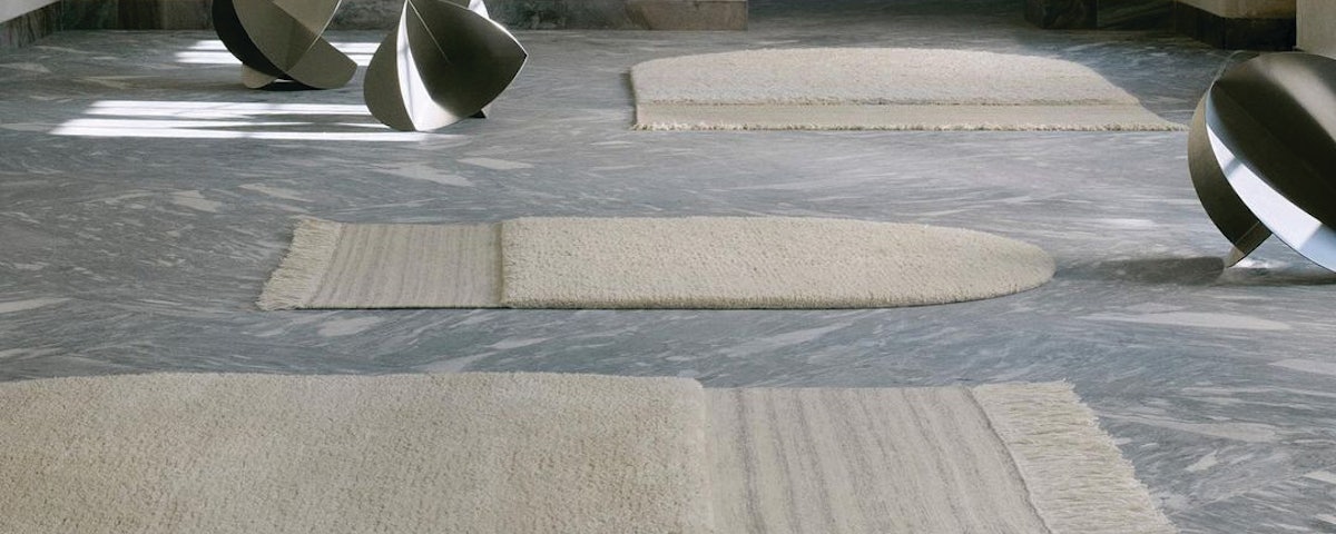 Eternal Eye Rugs on a marble floor