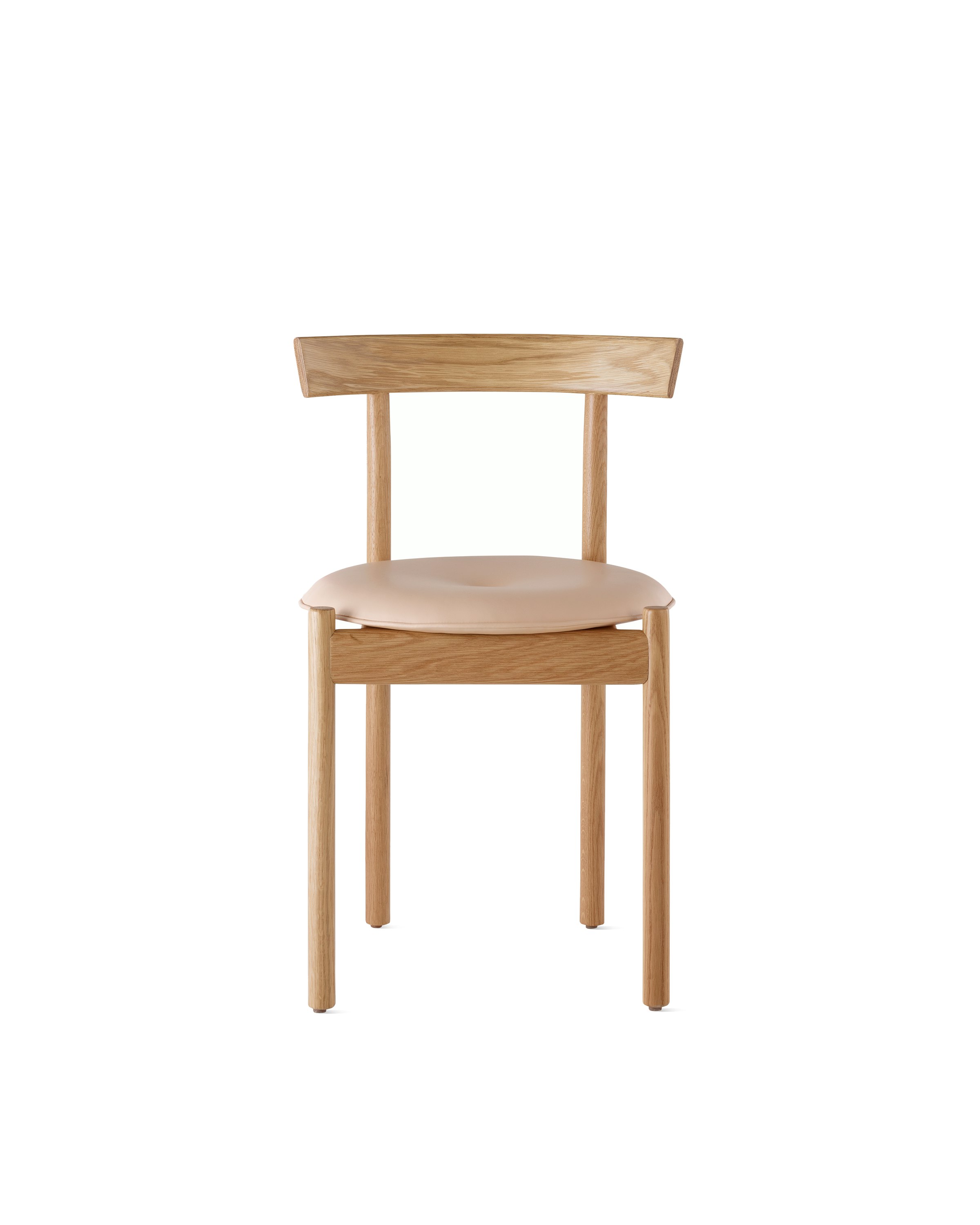 An oak Comma Chair with a seat pad, viewed from the front.