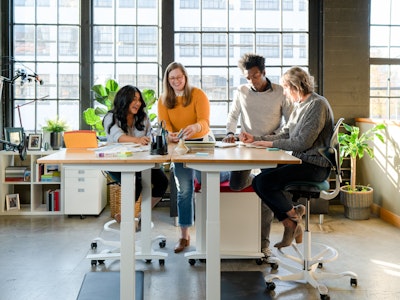 Jarvis Bamboo Standing Desk in office space