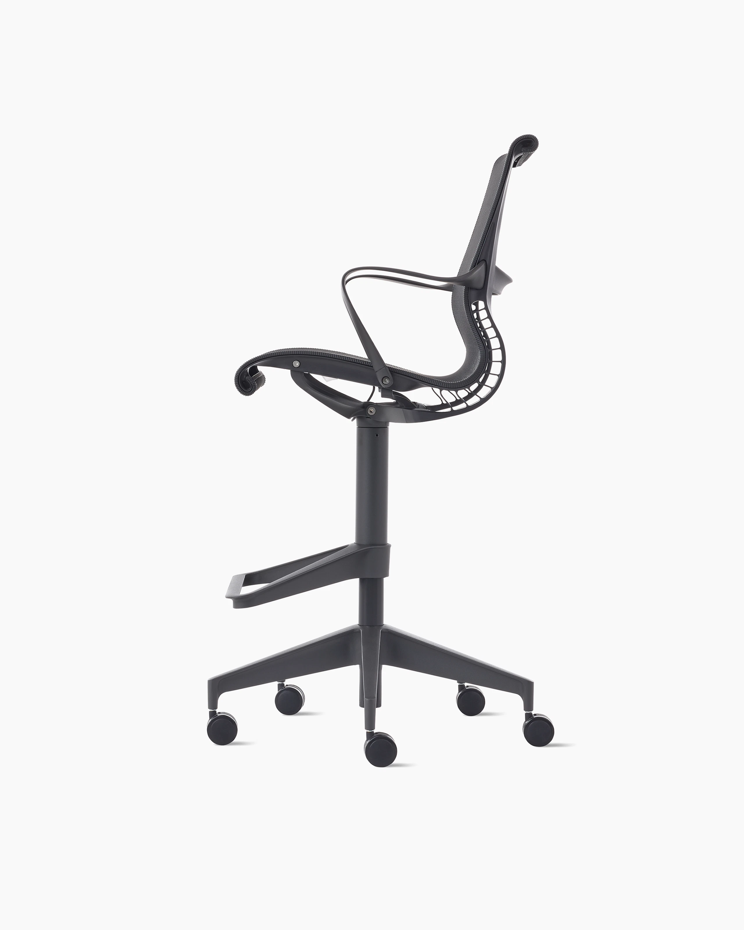 Side view of a Setu stool with arms in dark grey.