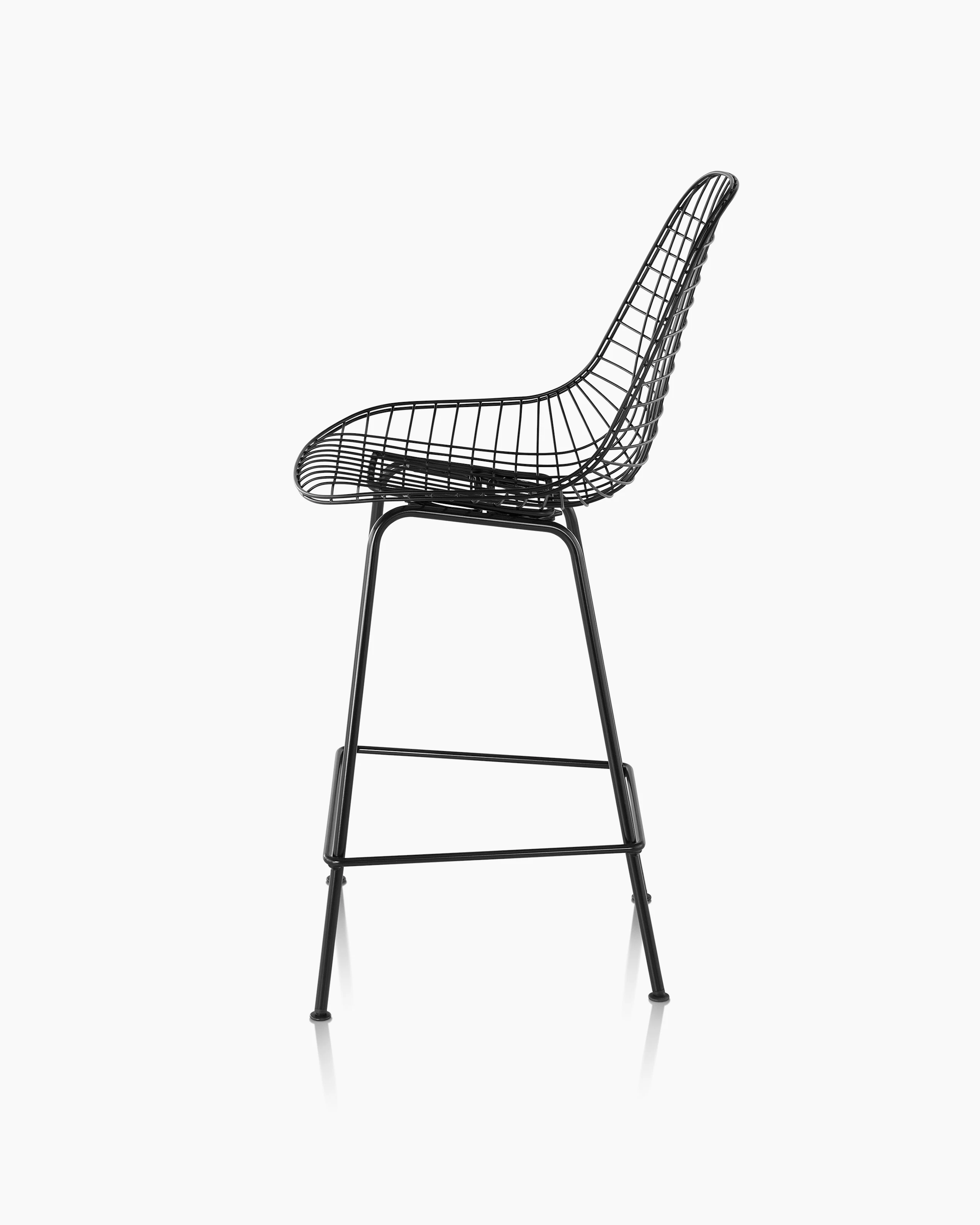 Eames Wire Stool Outdoor with black finish in counter height.