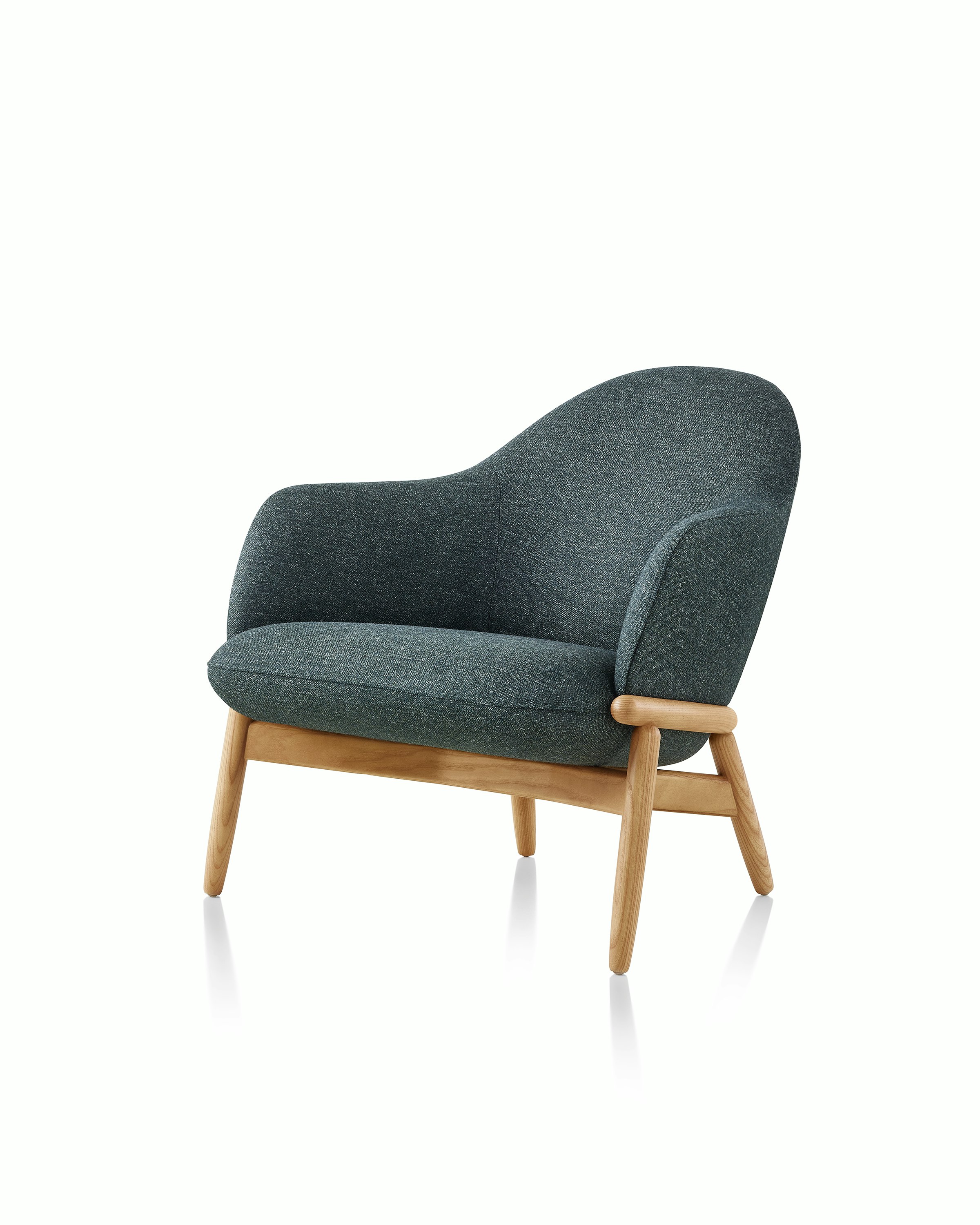 A mid-back Reframe Lounge Chair in Bellano Black Green, viewed from a three-quarter perspective.
