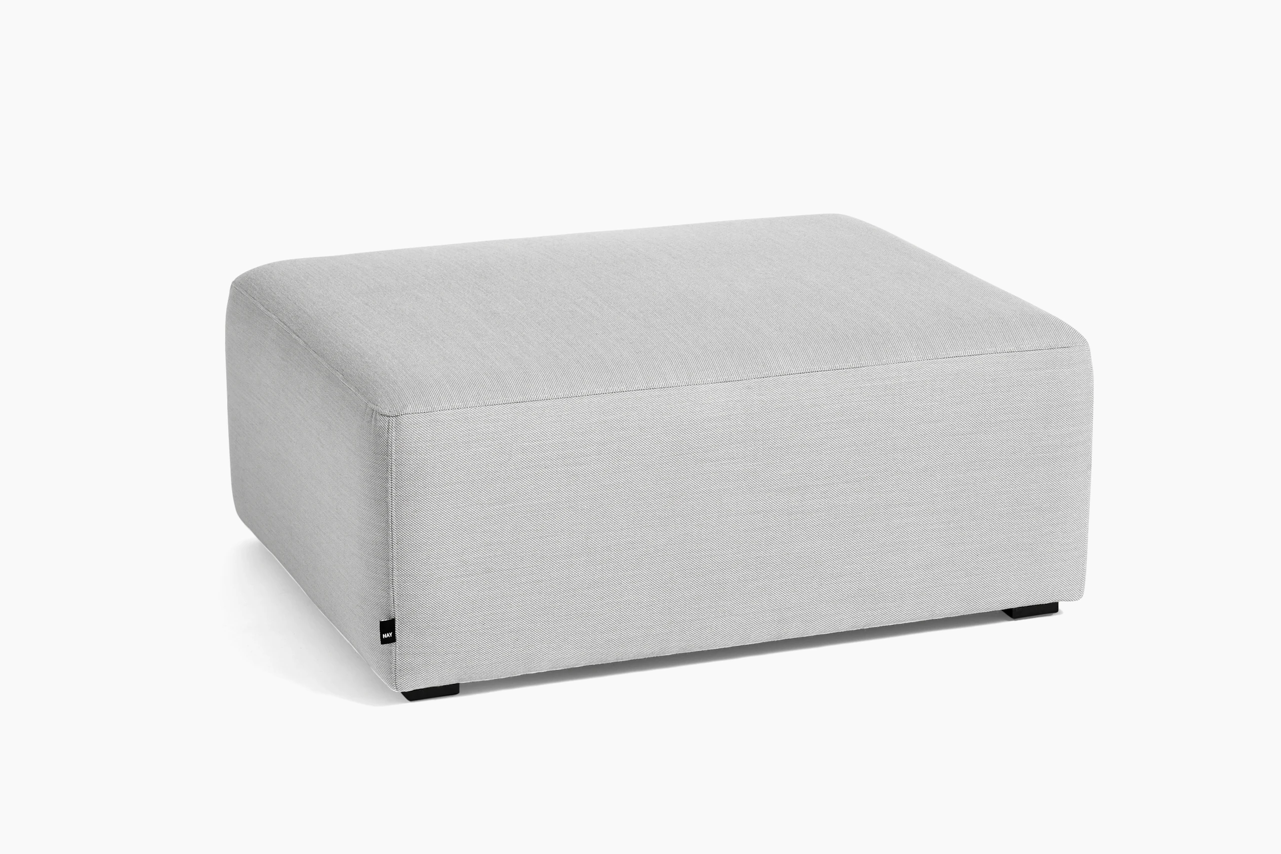 Grey Mags Ottoman, viewed at an angle.
