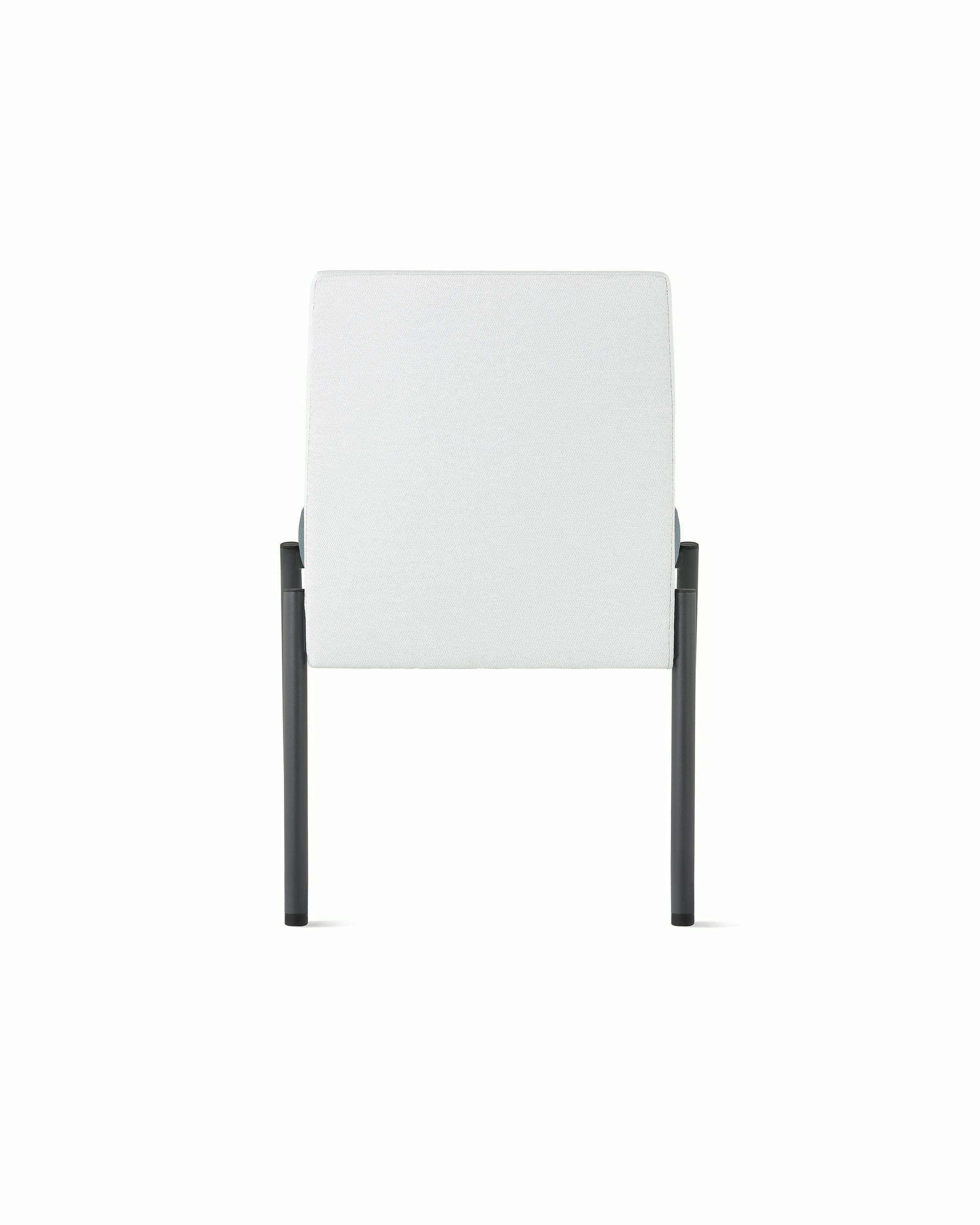 Back view of a Valor Stacking Chair without arms in a white back upholstery and black frame on white sweep.