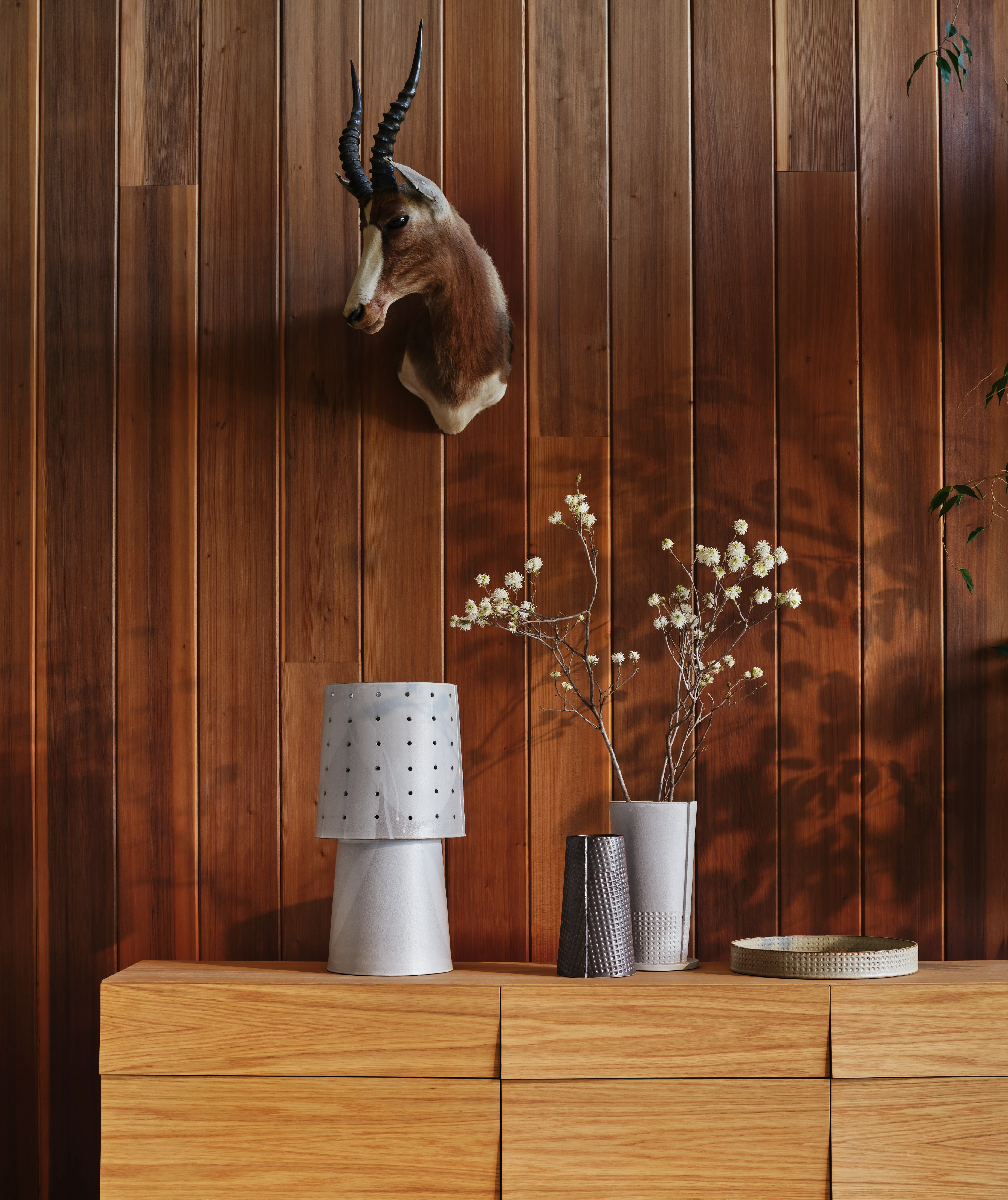 Funnel Table Lamp on a bedroom dresser