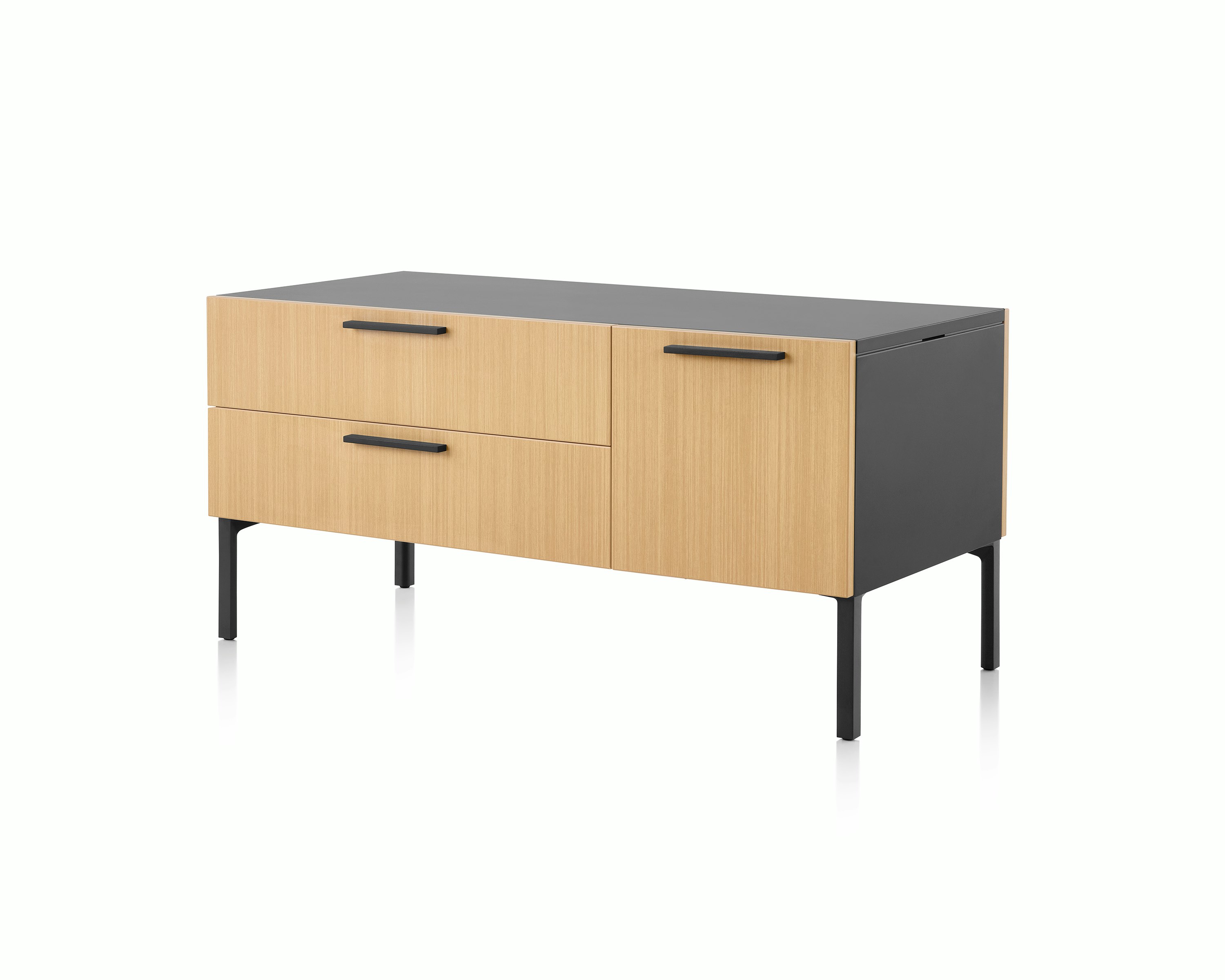 Brown and black Tu Wood shared credenza with box, tip-out tray and tip-out bin, viewed at an angle.