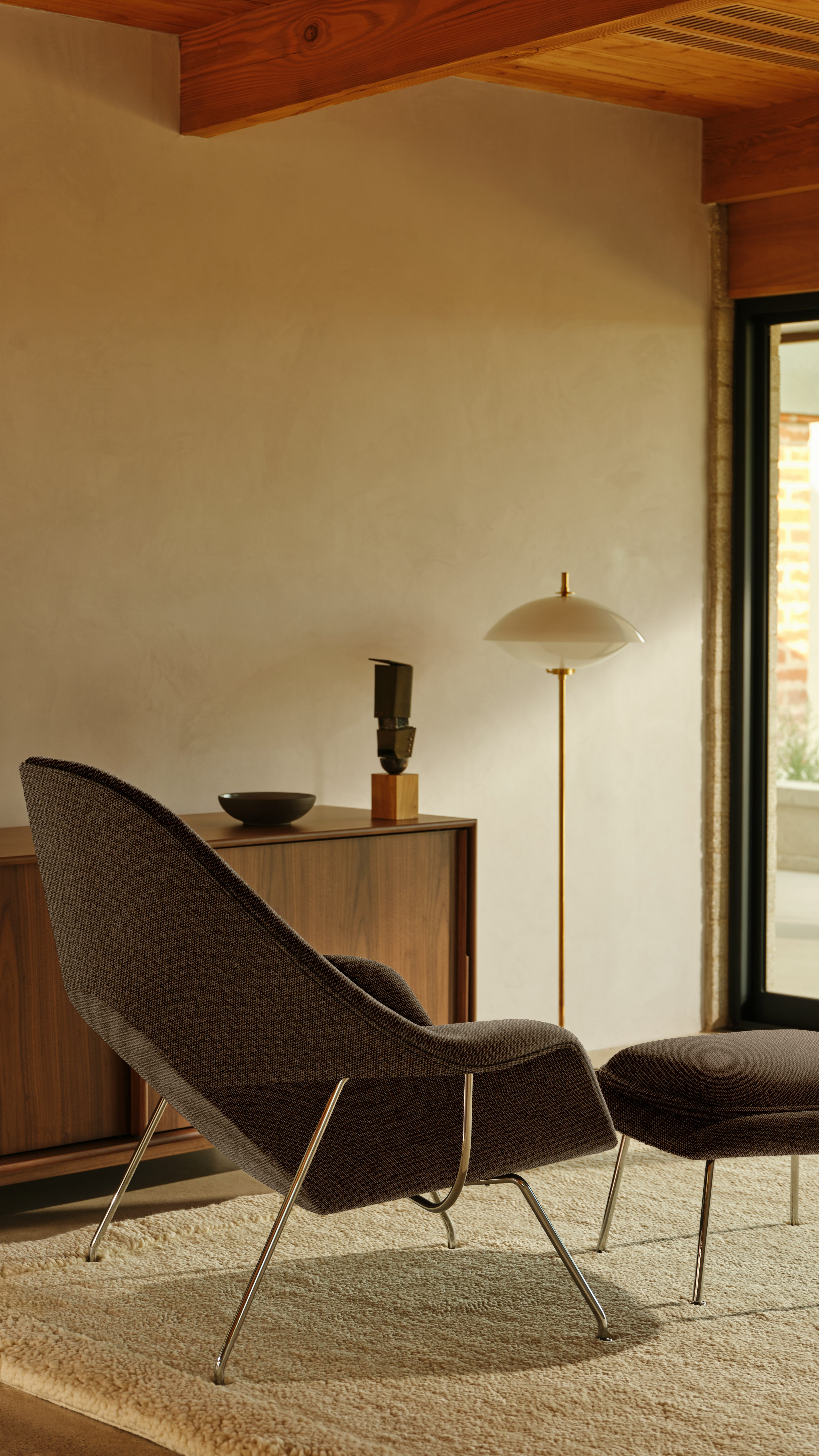 Womb Chair and Ottoman in Mocha with Mary Little artwork