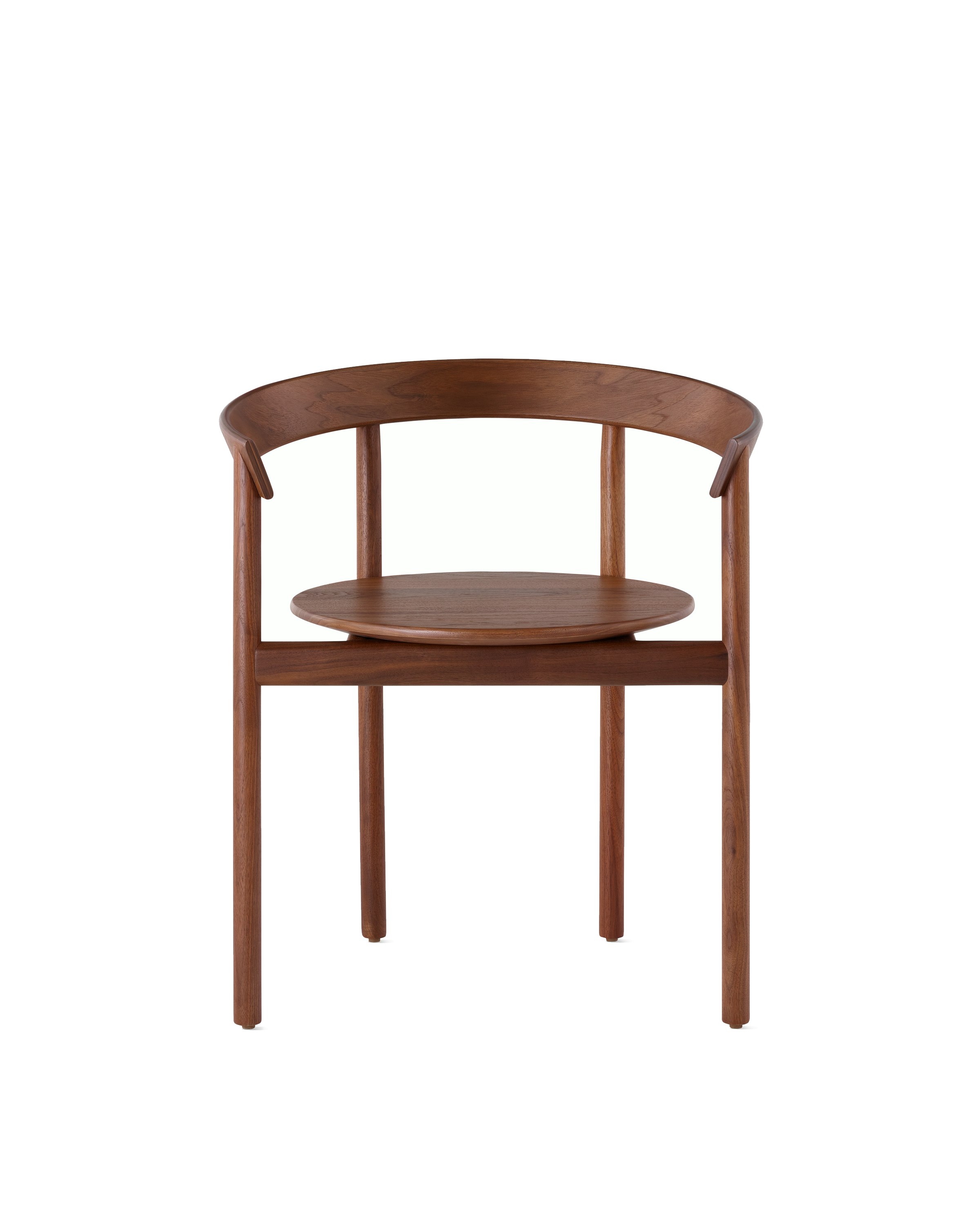 A walnut Comma Chair with arms, viewed from the front.