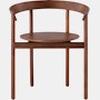 A walnut Comma Chair with arms, viewed from the front.