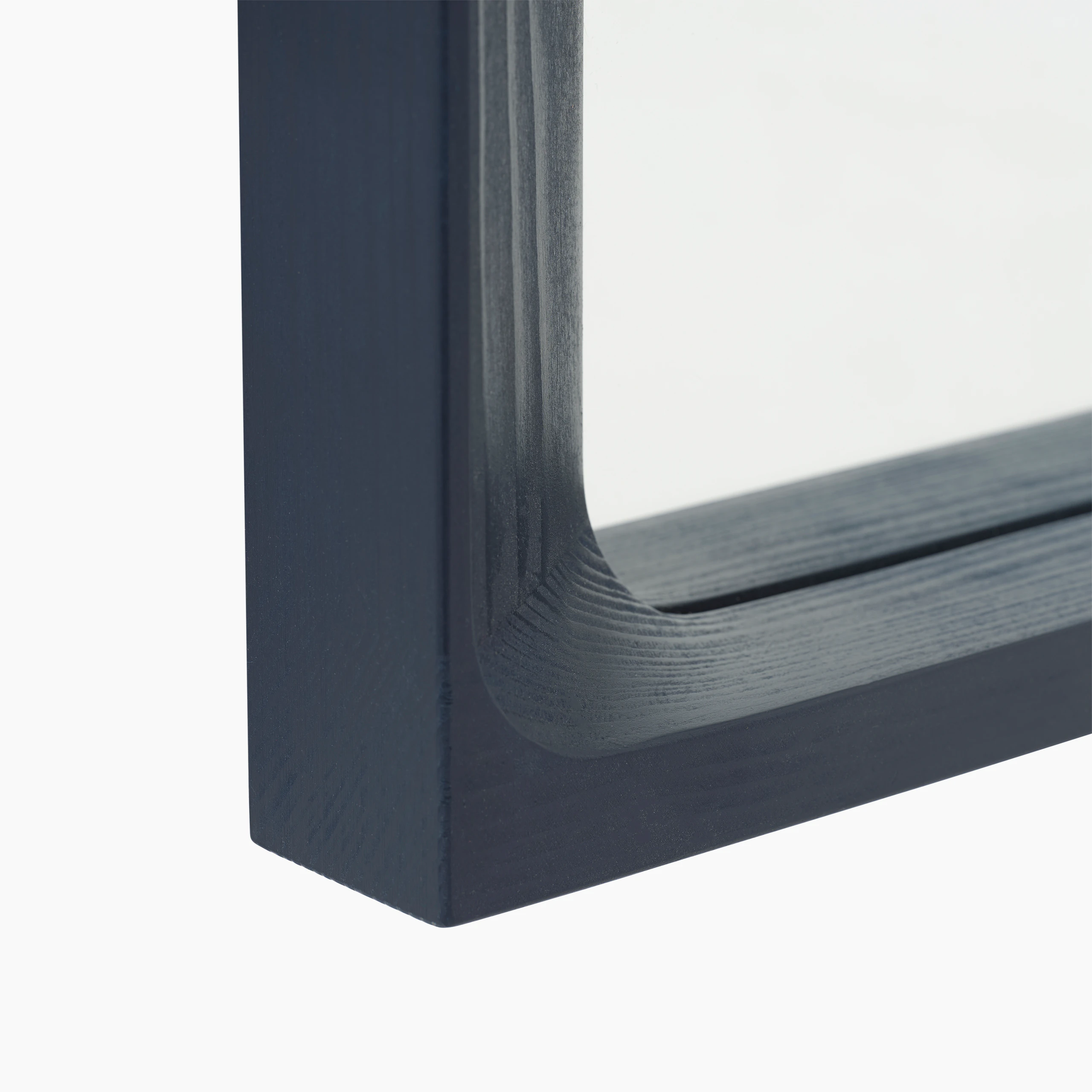Arced mirror midnight blue detail