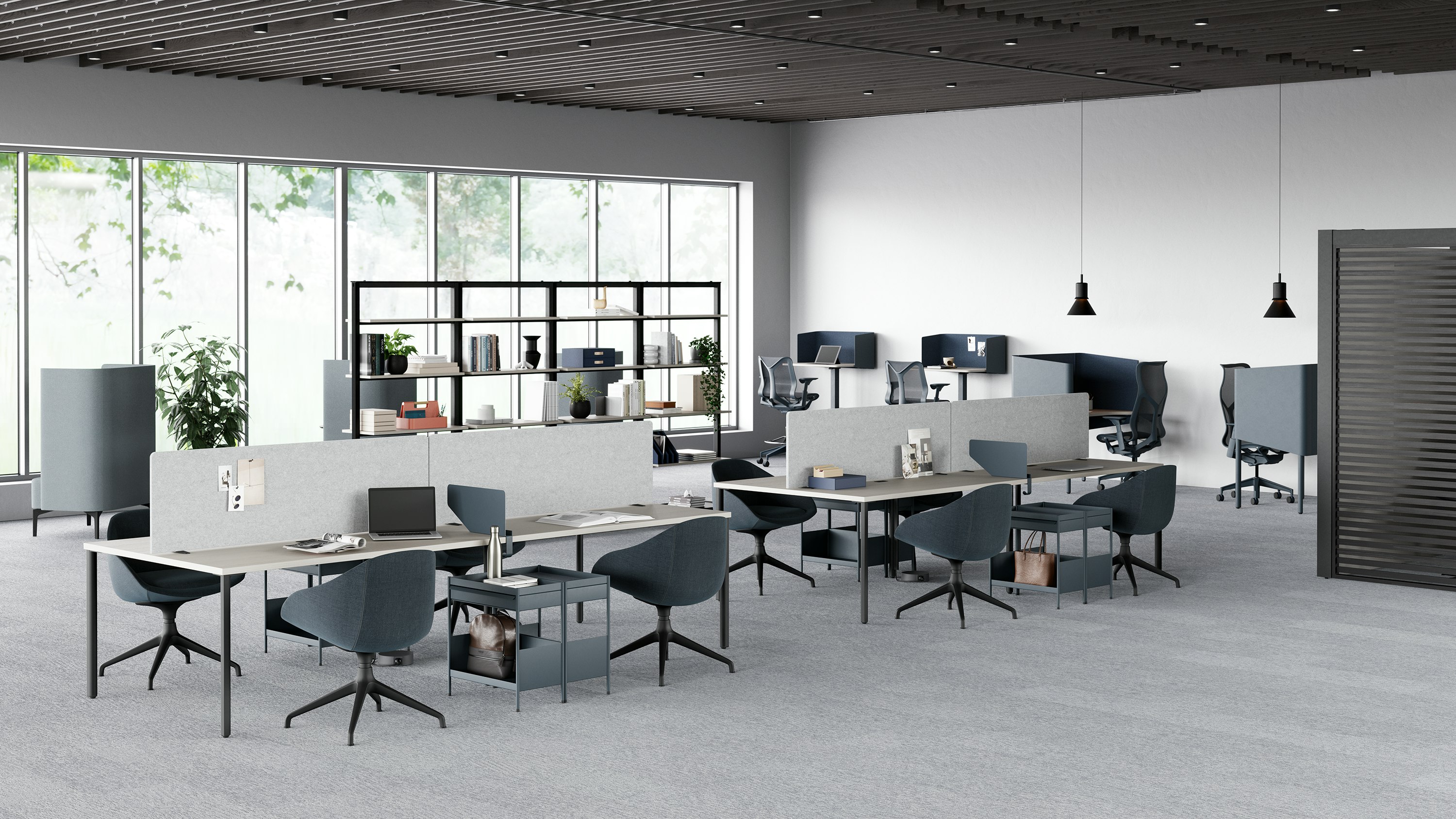 A selection of OE1 Workspace Collection products including OE1 Micro Packs, OE1 Nooks, OE1 Agile Wall and OE1 Storage Trolleys are featured in a study hall setting.