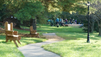 A group of MillerKnoll employees participate in a volunteer event for Ronald McDonald House at a park in Grand Rapids, MI.