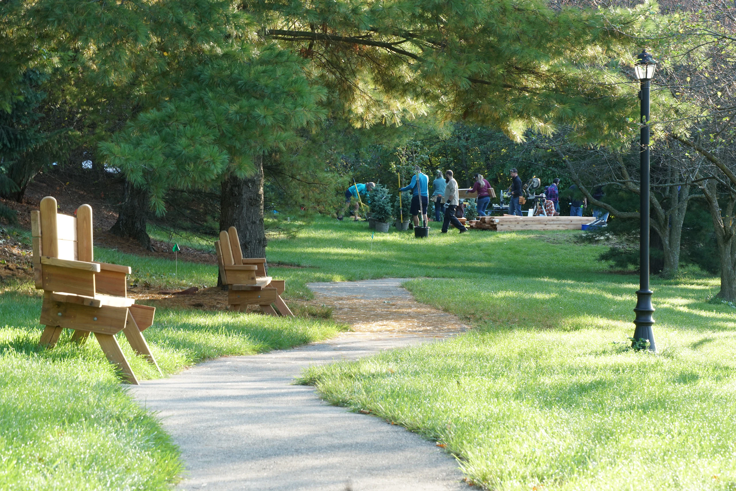 A group of MillerKnoll employees participate in a volunteer event for Ronald McDonald House at a park in Grand Rapids, MI.