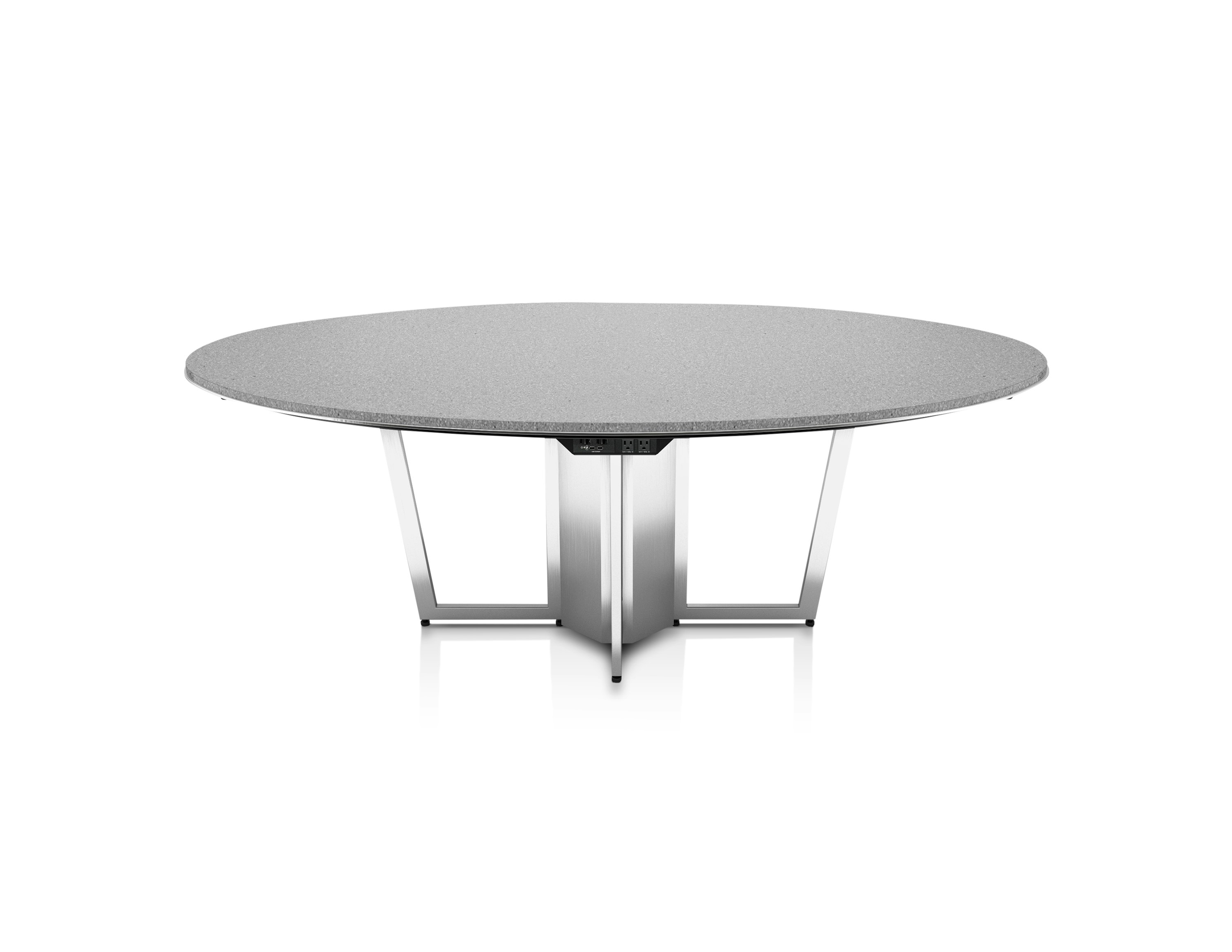 Highline Meeting Table with round Caesarstone Raw Concrete top, Polished Chrome base, undermount power, front view.