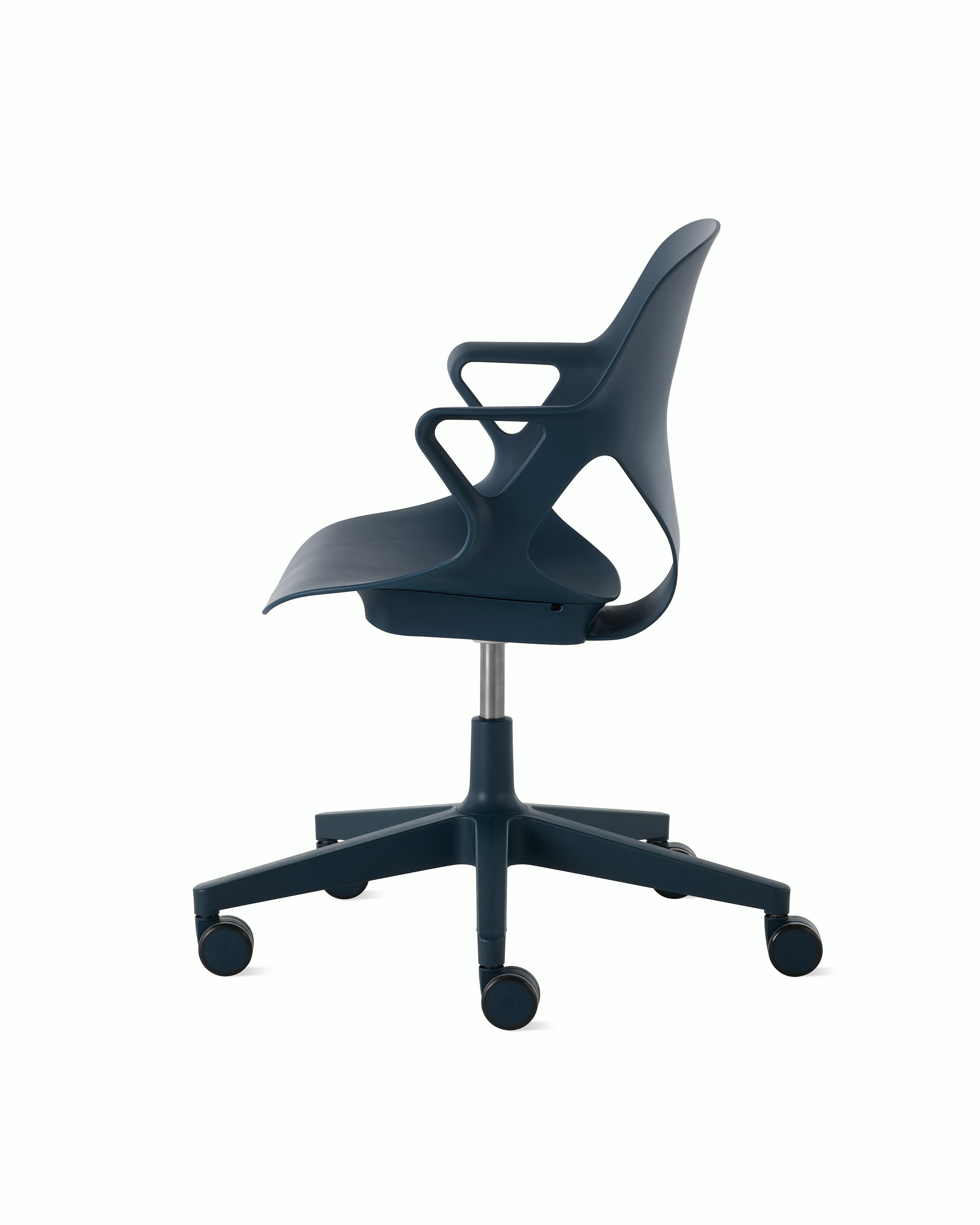 Side view of a Zeph chair with fixed arms in dark blue.