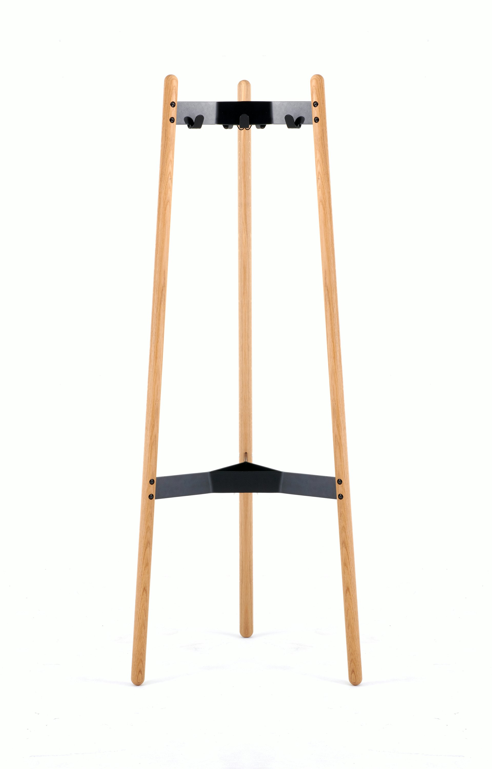 A front view of the Hudson Coat Stand with oak dowel legs with black metal supports.
