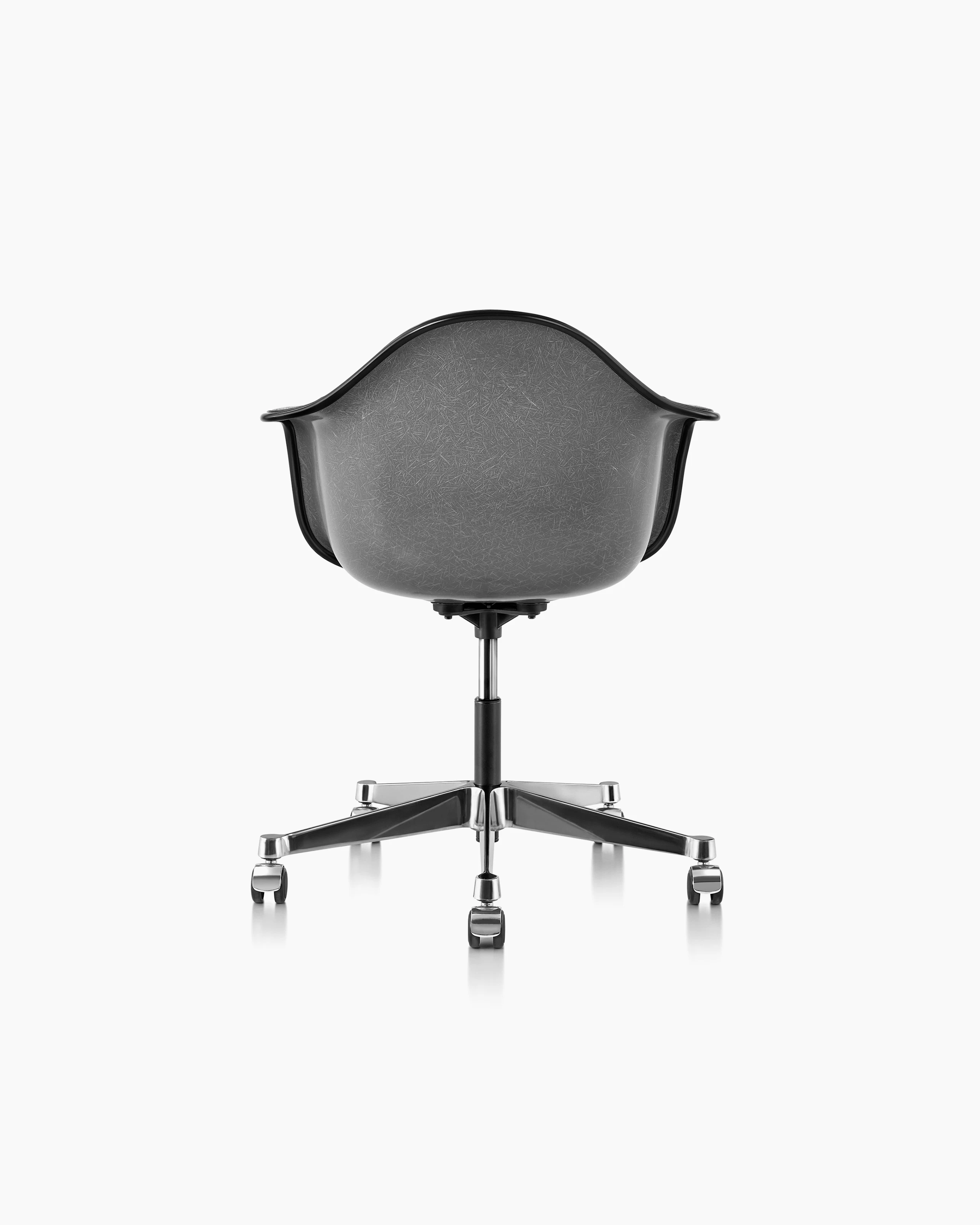 Eames Task Arm Chair with a Elephant Hide Grey fiberglass shell upholstered in Hallingdal 126, viewed from behind.