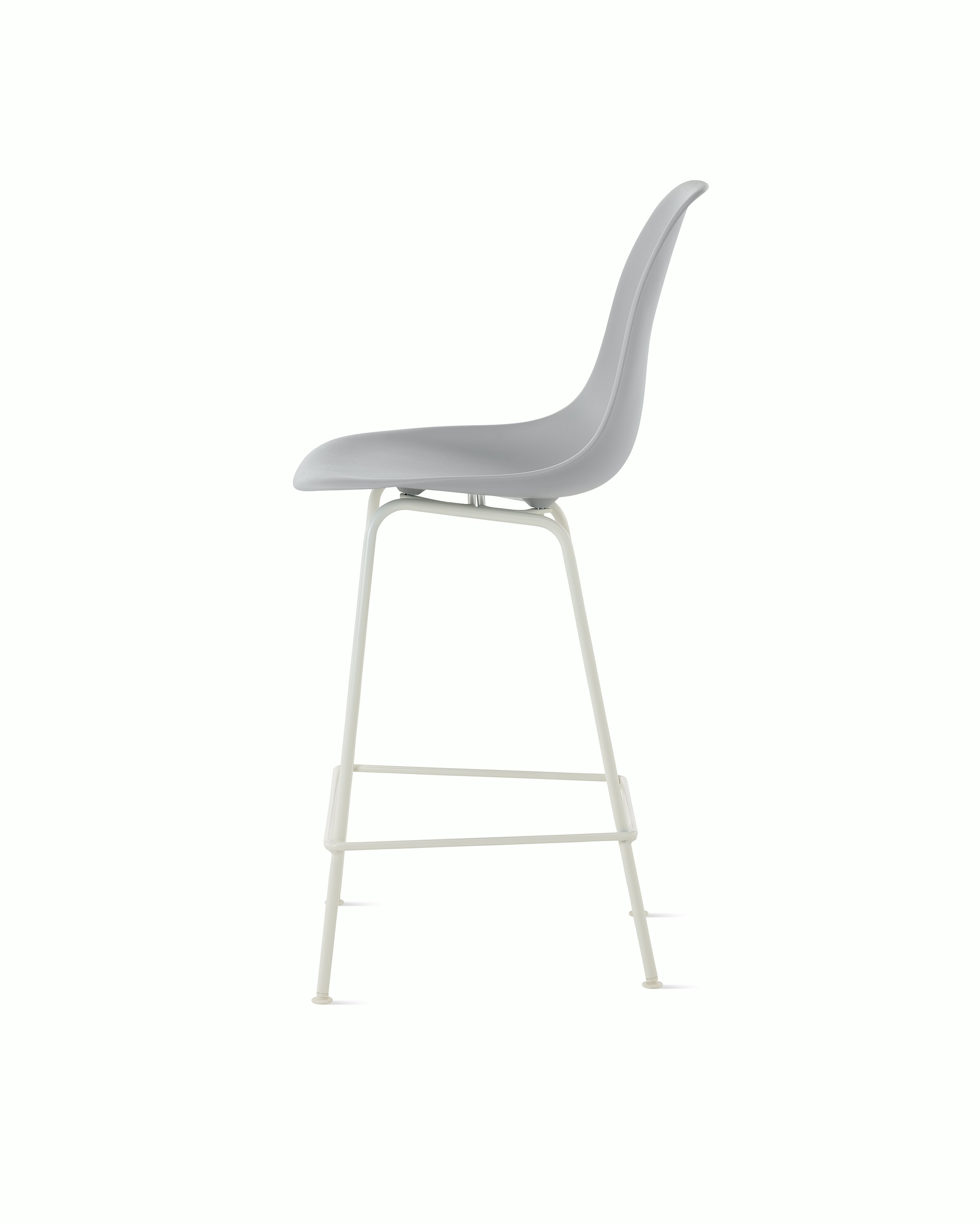 Side of light grey plastic shell stool on 4 leg base.