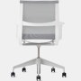 Rear view of a Setu chair with grey suspension, white frame and silver alloy base.