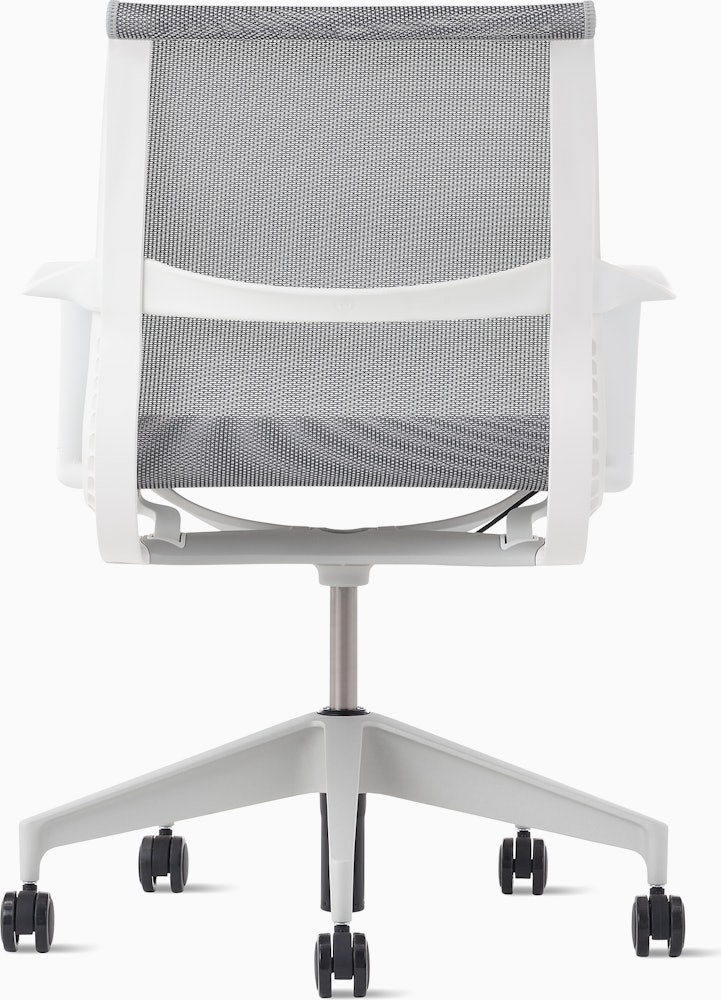 Rear view of a Setu chair with grey suspension, white frame and silver alloy base.