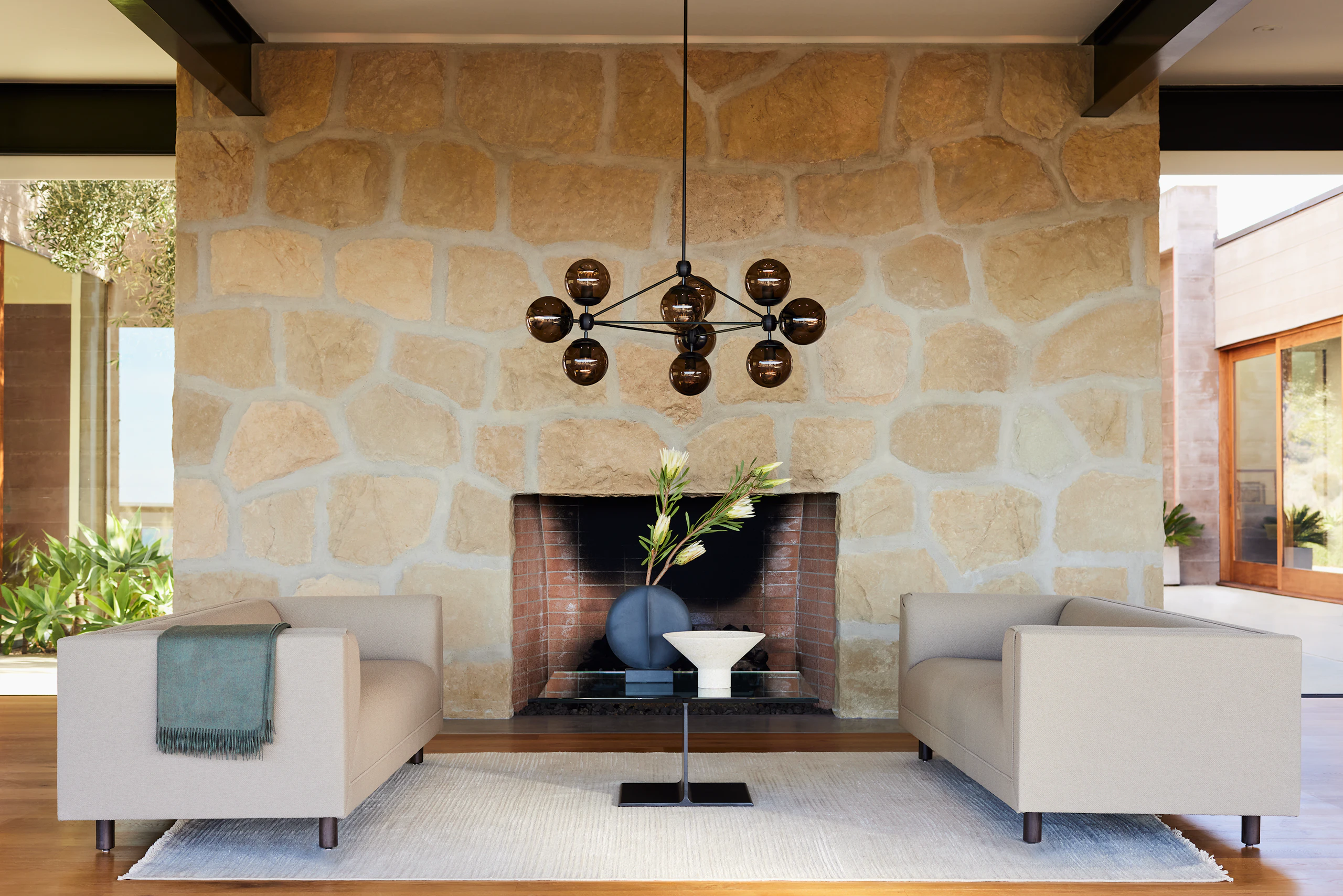 Living Room environmental photo with two Rolled Arm sofas facing each other and an I-Beam coffee table.