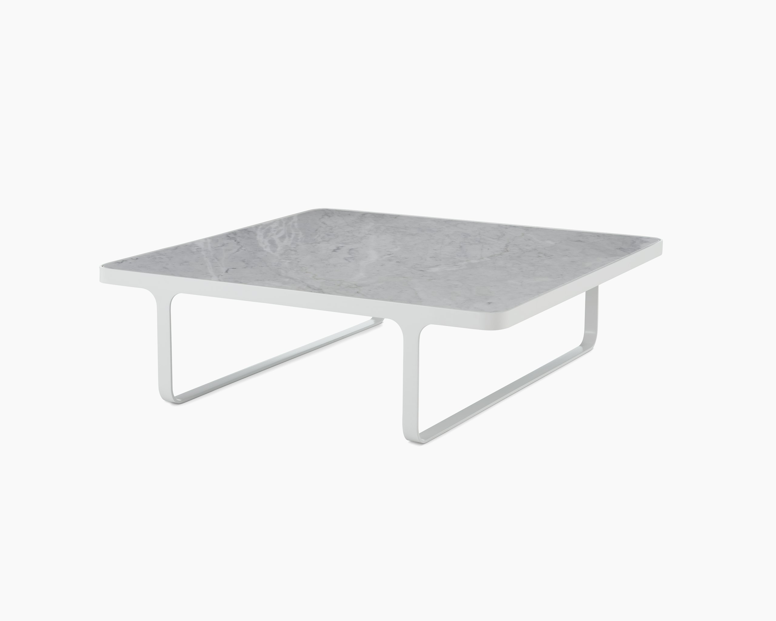 White sweep shot of white Trace Square Coffee Table with marble top.