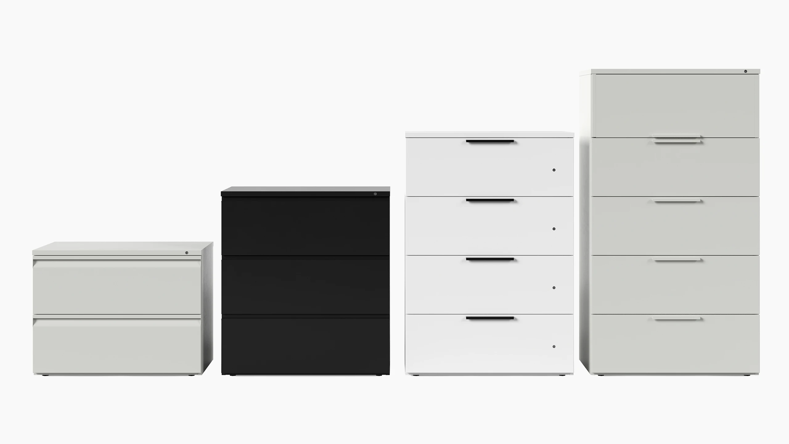 Four grey, white and black Series 2 lateral files with various pull types, viewed from the front.