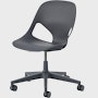Front angle view of a dark grey armless Zeph chair.