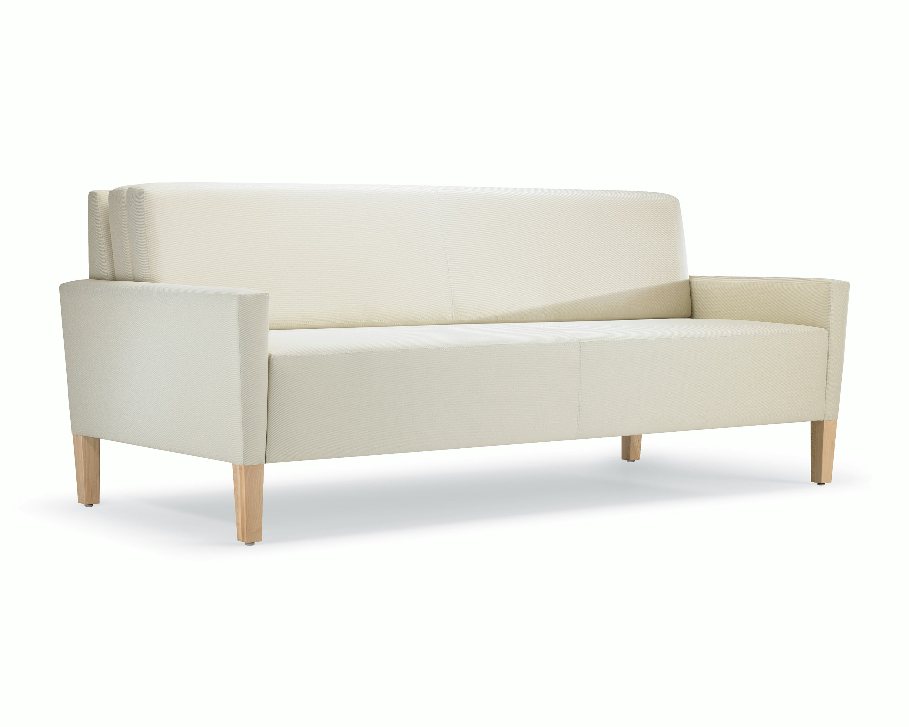 A three-quarter view of a Brava Flop Sofa in white textile with maple legs.