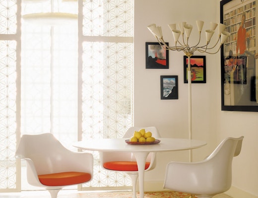 Saarinen Dining Table, Saarinen Tulip Arm Chair Saarinen Tulip Dining Table and Saarinen Tulip Chairs with Orange seat pads