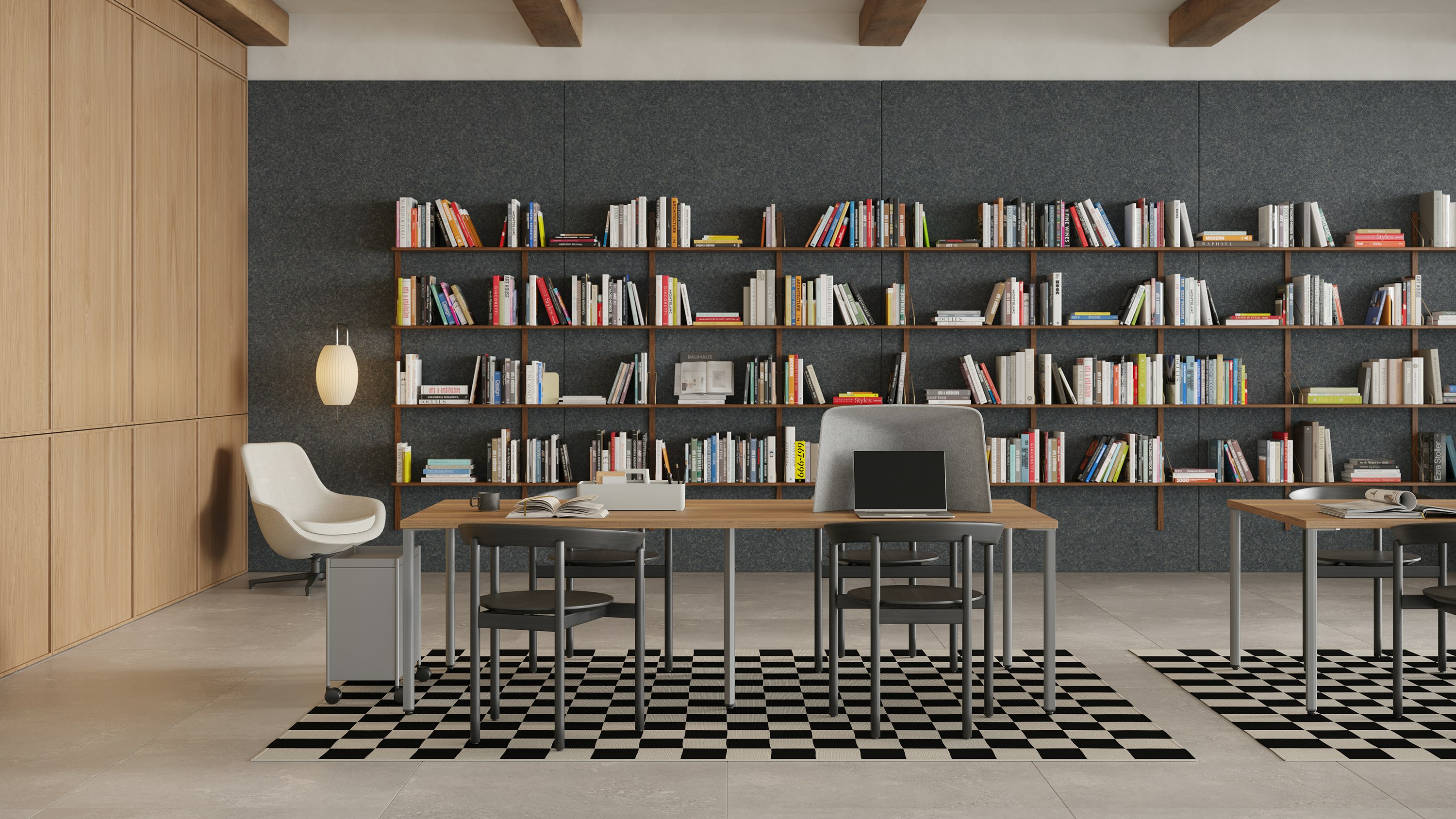 Study Hall with brown OE1 Project Tables, OE1 Storage Trolley, OE1 Workbox and OE1 Personal Hoodie with black Comma Chairs, and bookshelves in the background.