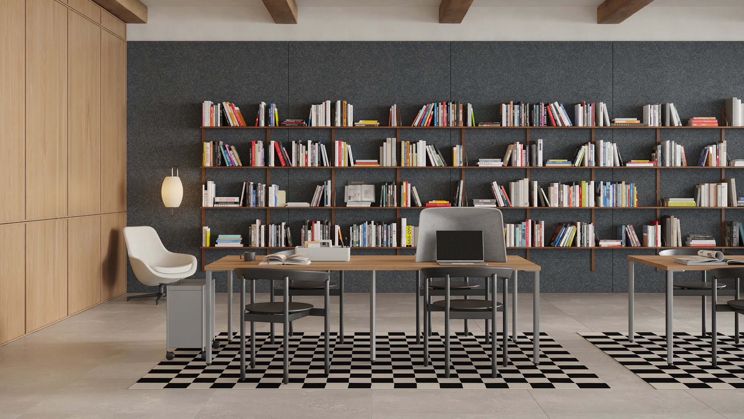 Study Hall with brown OE1 Project Tables, OE1 Storage Trolley, OE1 Workbox and OE1 Personal Hoodie with black Comma Chairs, and bookshelves in the background.