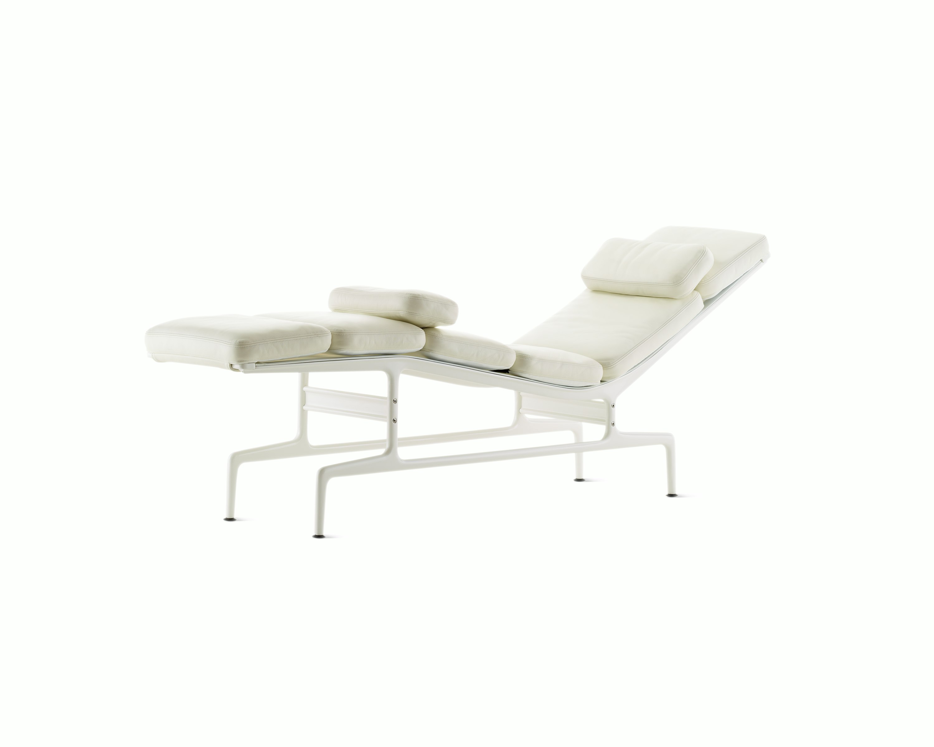 An all-white Eames Chaise, viewed from the front at an angle.