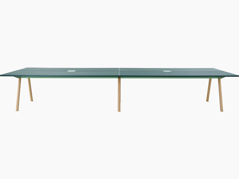 1400X4400 Morse table with dark green forbo top and oak legs.
