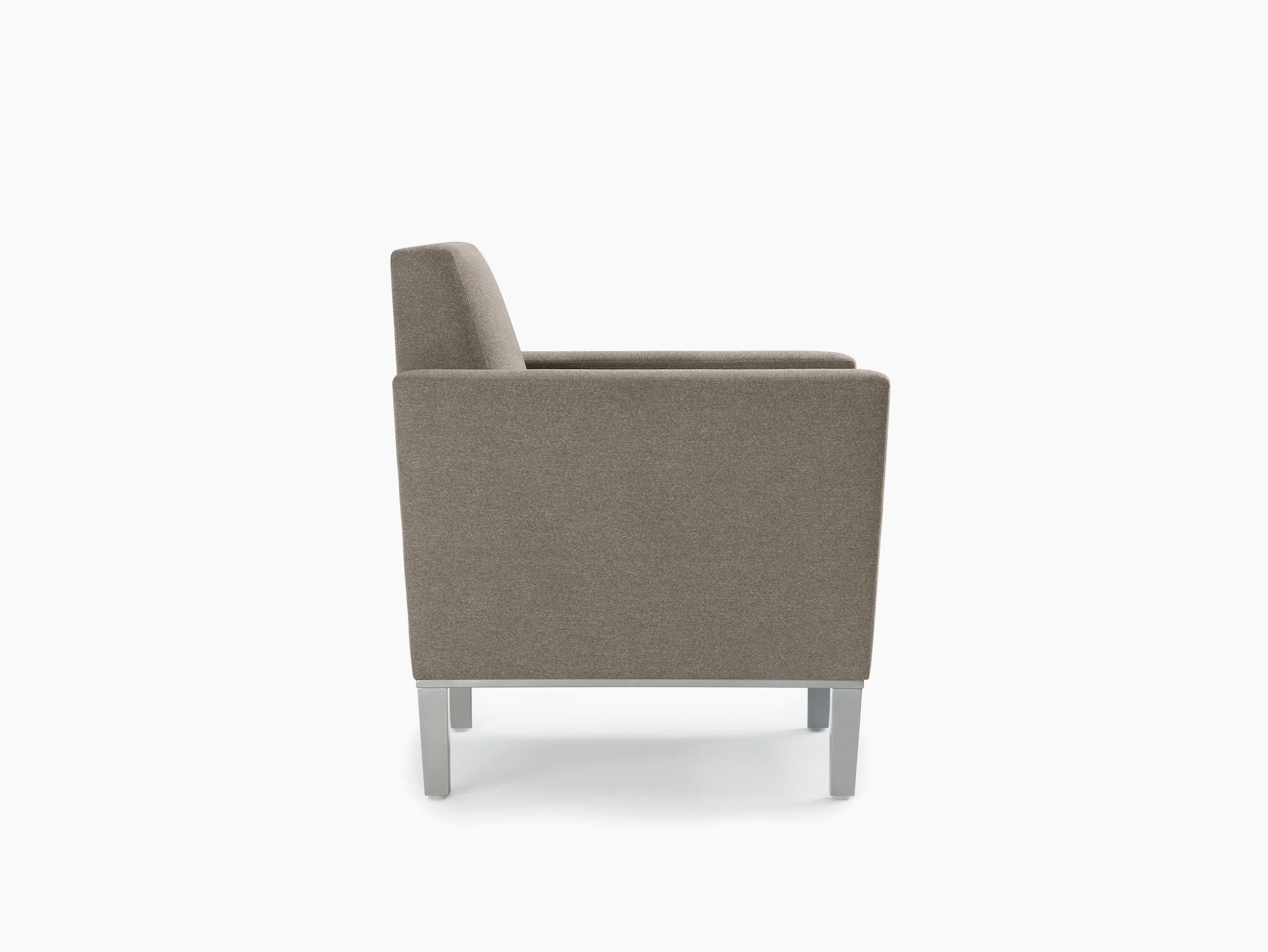 Side view of a Brava Platform Lounge System chair with upholstered arms with metal base.