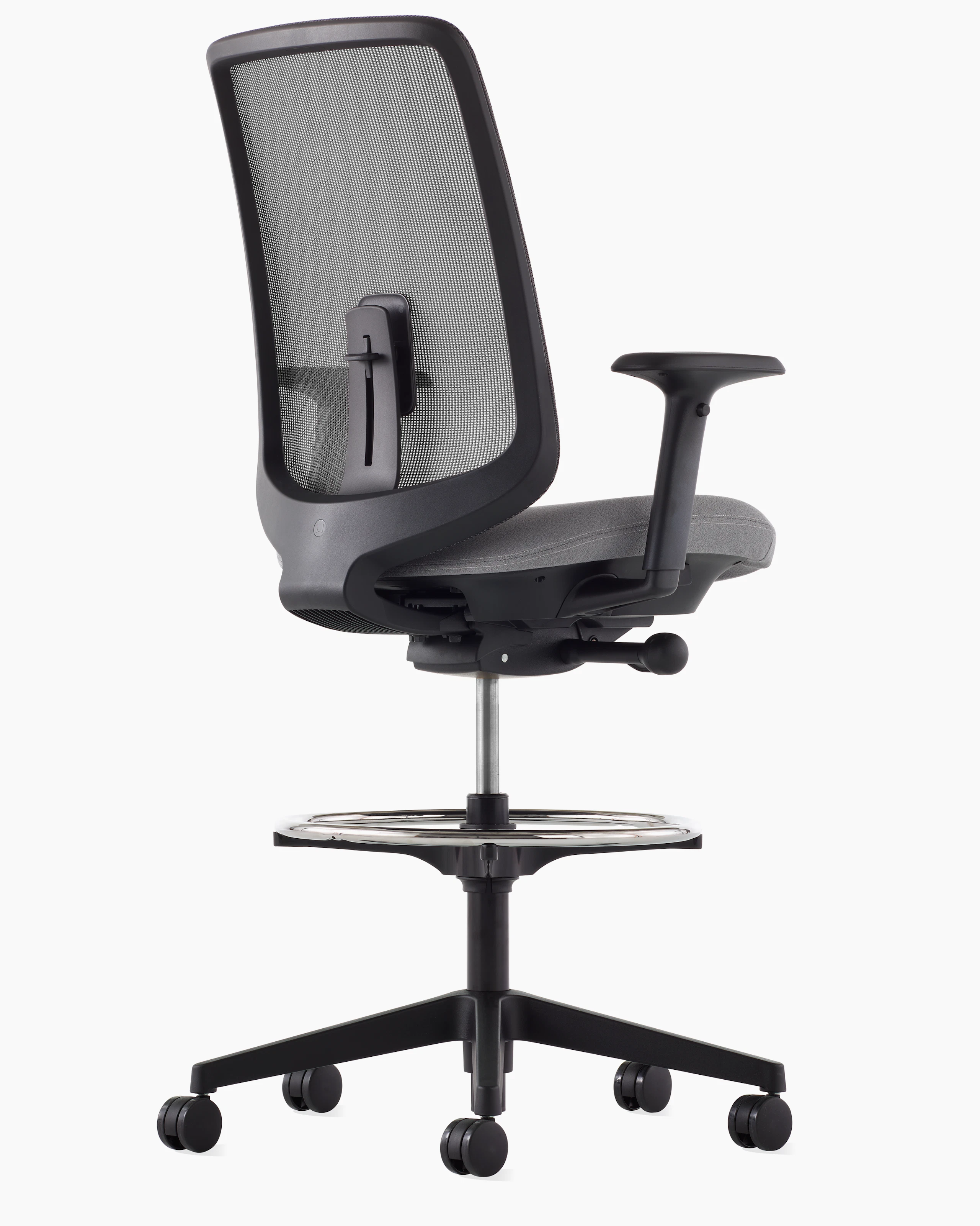 A black Verus Stool with a suspension back, grey seat and black frame viewed at an angle.