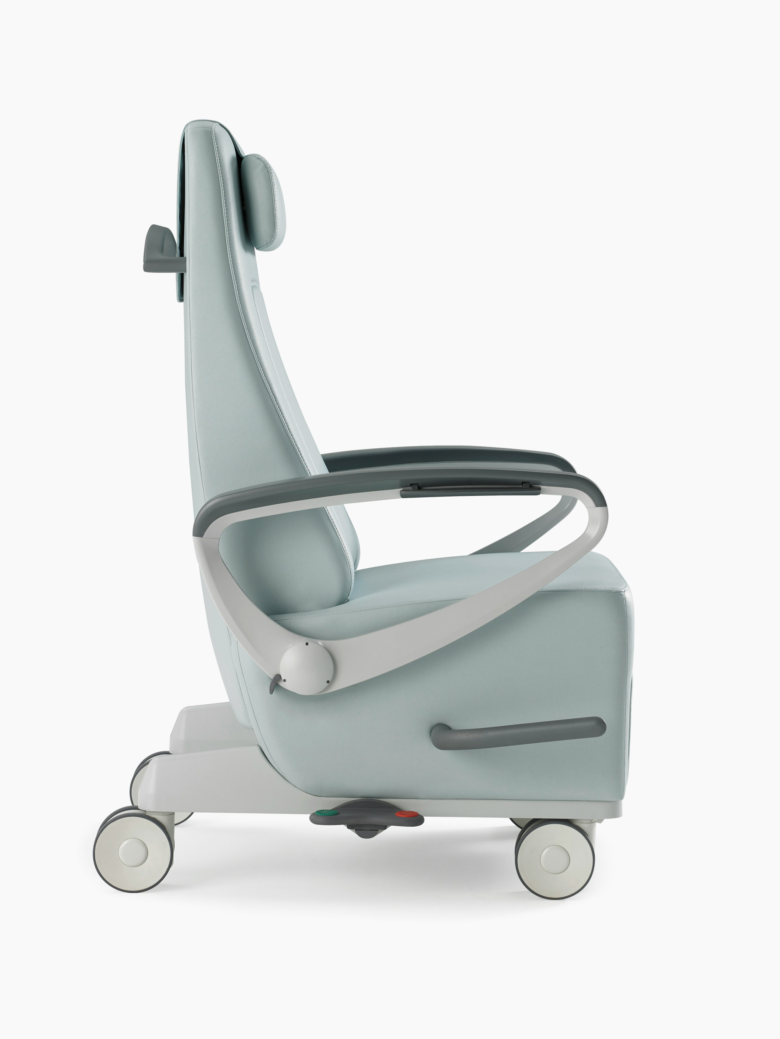 Nemschoff Ava Recliner with arcade back in a light blue upholstery with a headrest, viewed from the side.