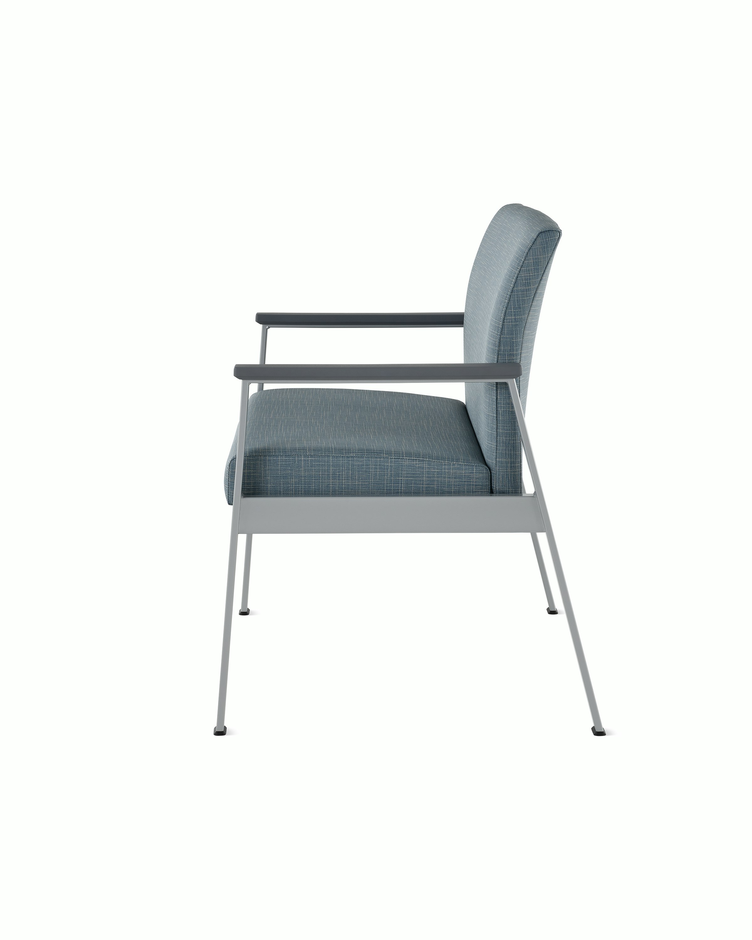 Side view of an Easton Plus Chair with blue upholstery, metallic four leg base and slate grey arm caps.