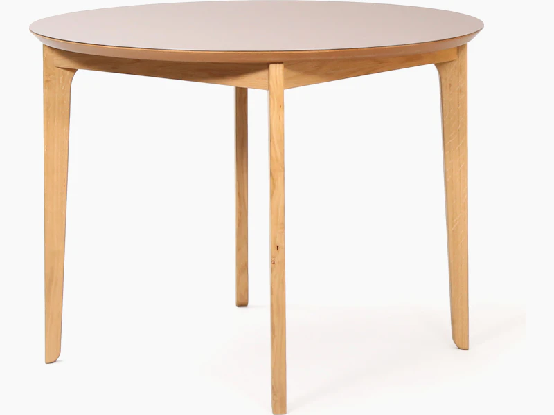 A round naughtone Dalby Café Table, viewed at an angle.