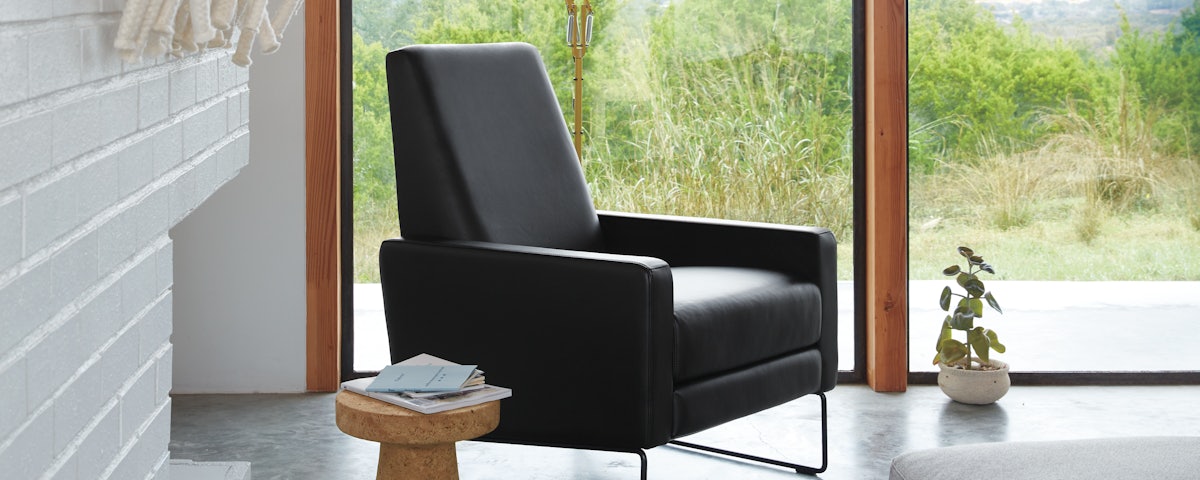 Flight Recliner and Vitra Cork Side Table in a living room setting