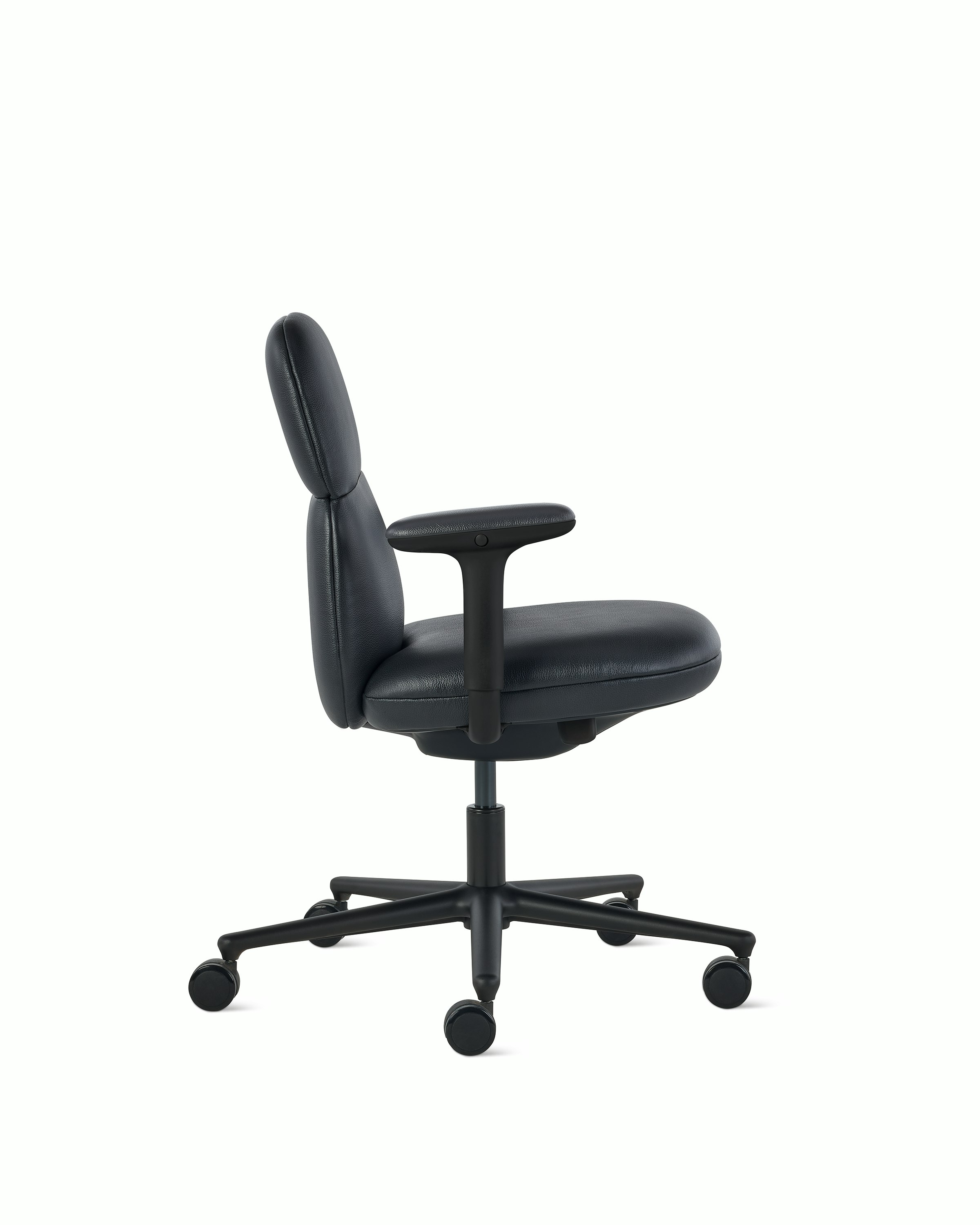 Side view of a mid-back Asari chair by Herman Miller in black leather with height adjustable arms.