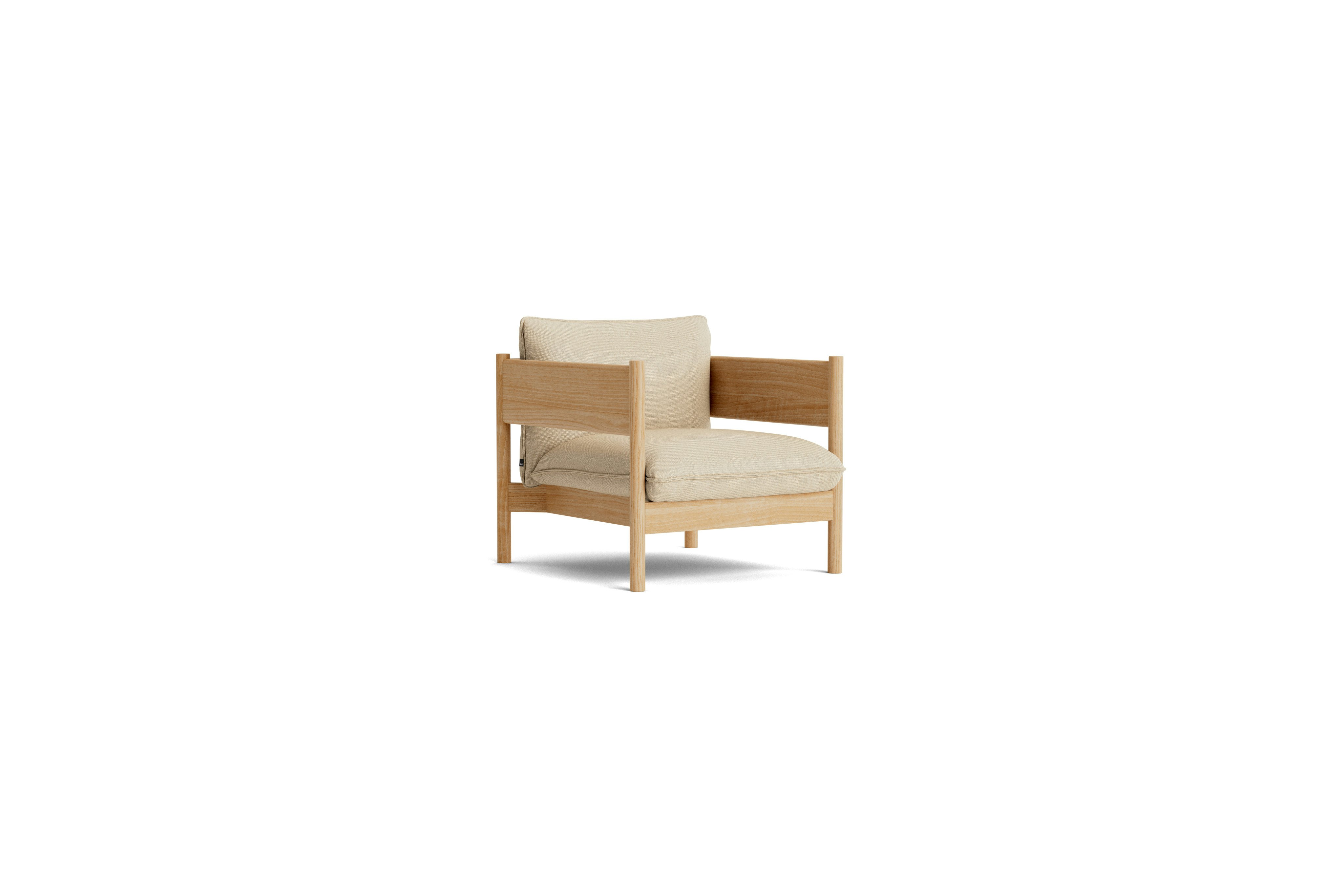 Arbour Club Armchair with oiled oak base and tan upholstery viewed from an angle