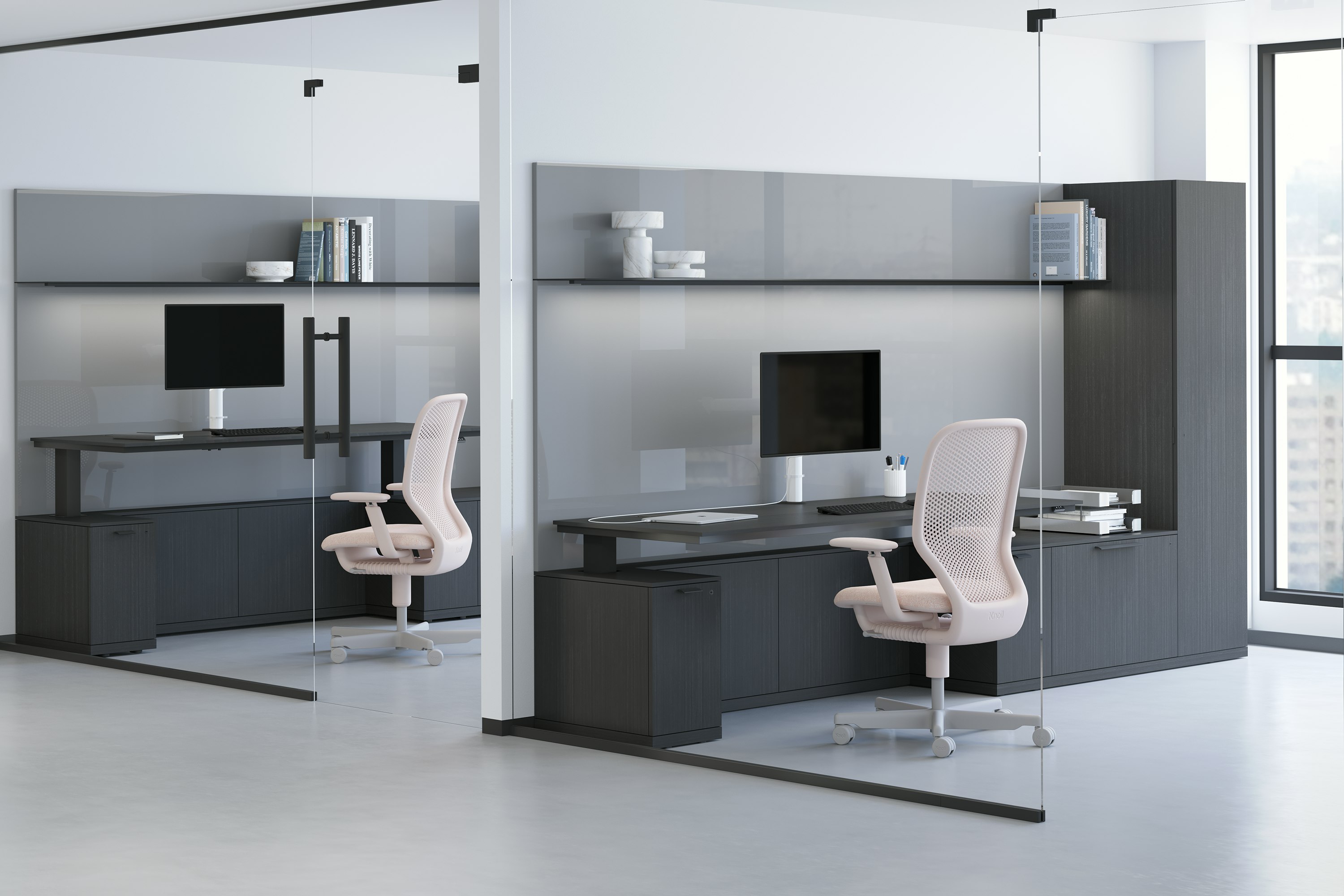 A private office featuring a height-adjustable table, workwall, shelf and credenzas in a dark brown premium wood veneer finish.