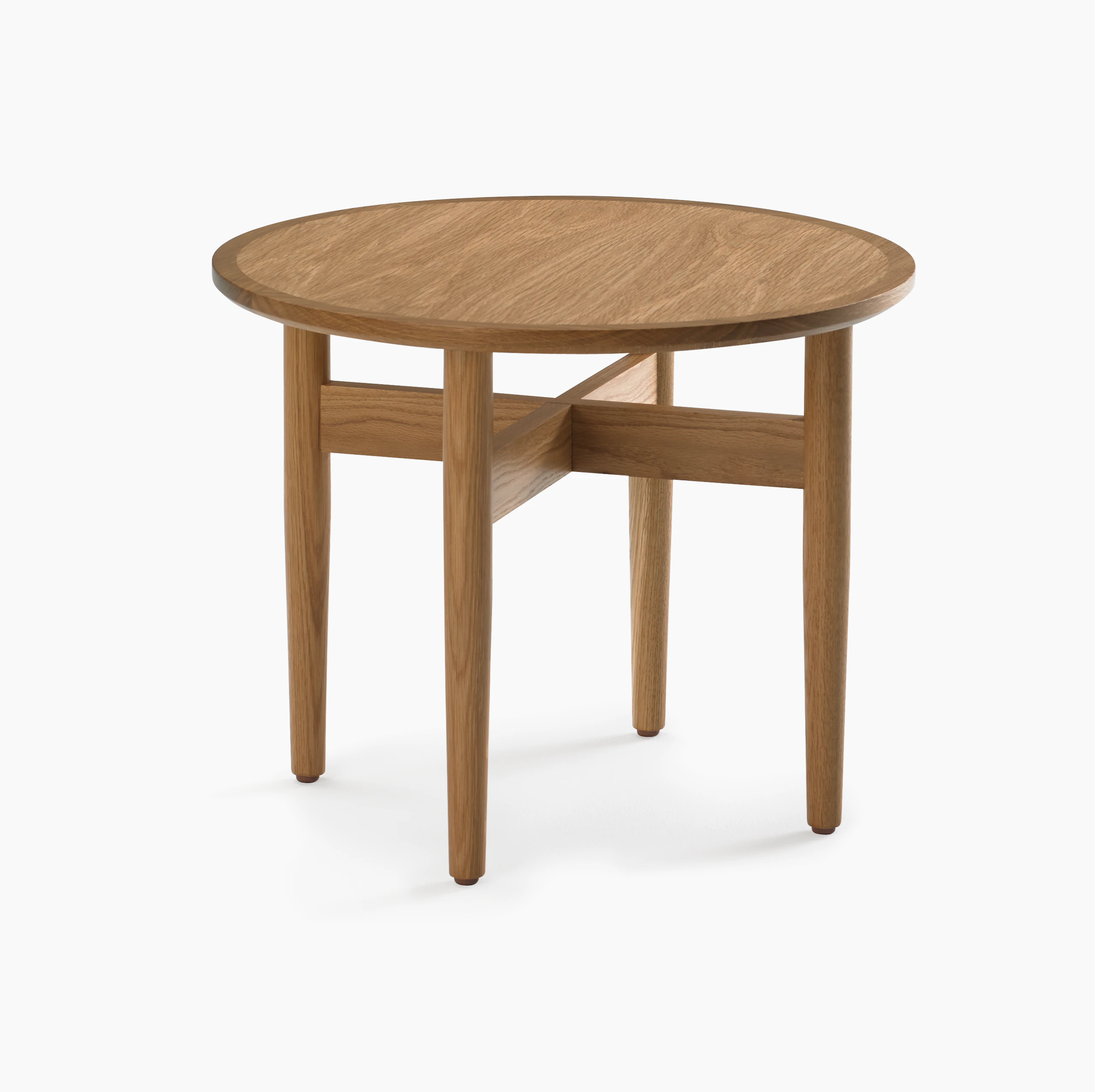 A round Hemlock side table in oak.