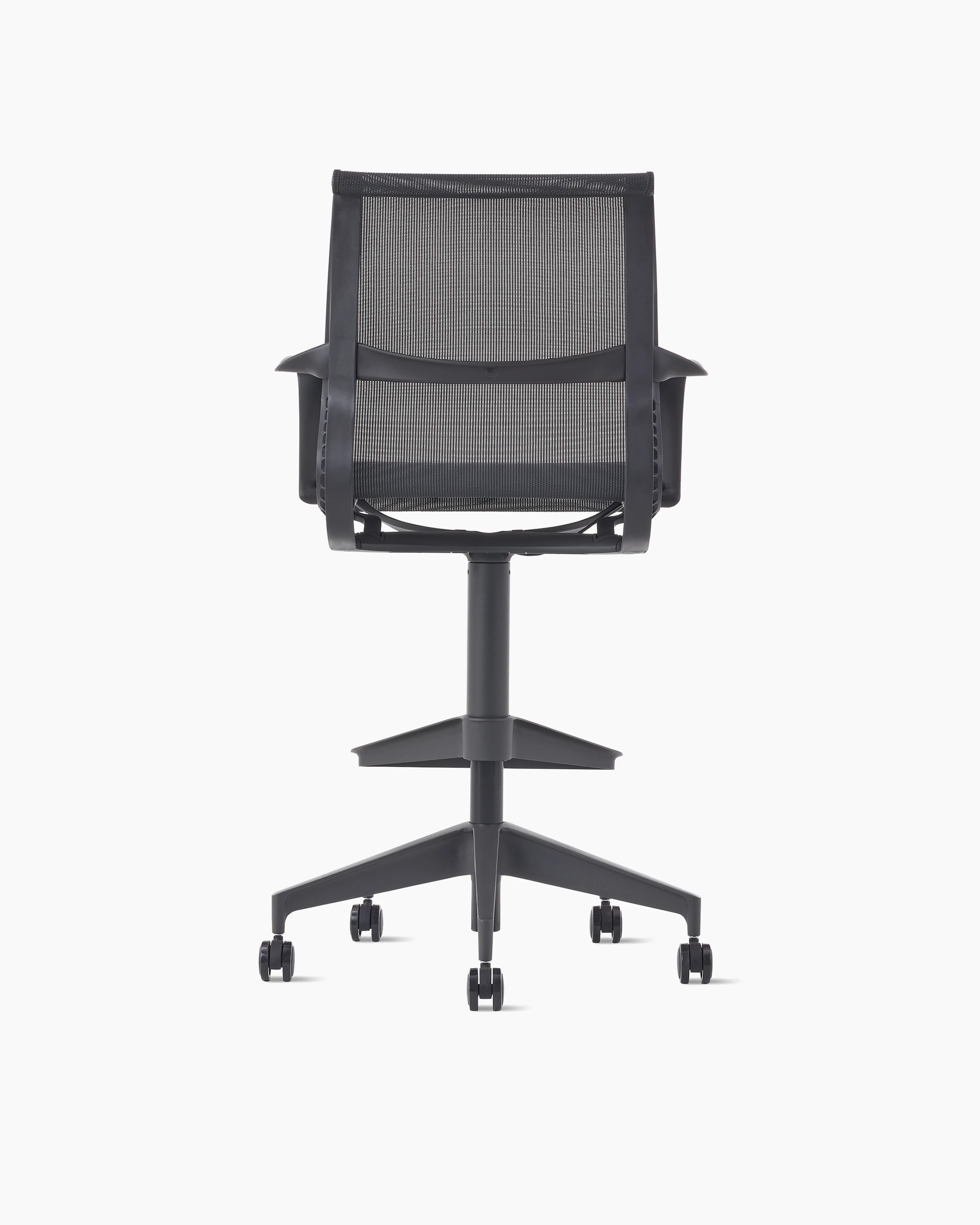 Rear view of a Setu stool with arms in dark grey.