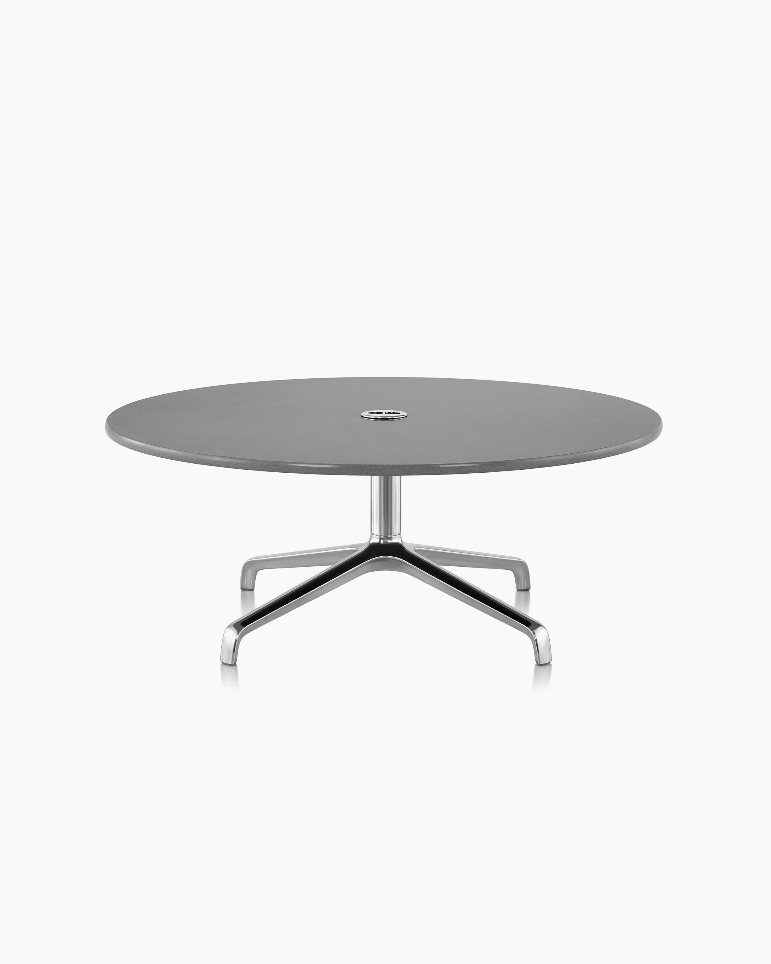 16" Striad Table as an occasional table in concrete quartz with 4-star base.