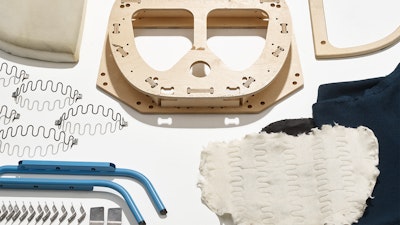 Wood, metal, fabric, and foam materials on a white display.