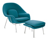 An aegean Womb Chair & Ottoman viewed from an angle An aegean Womb Chair & Ottoman viewed from an angle