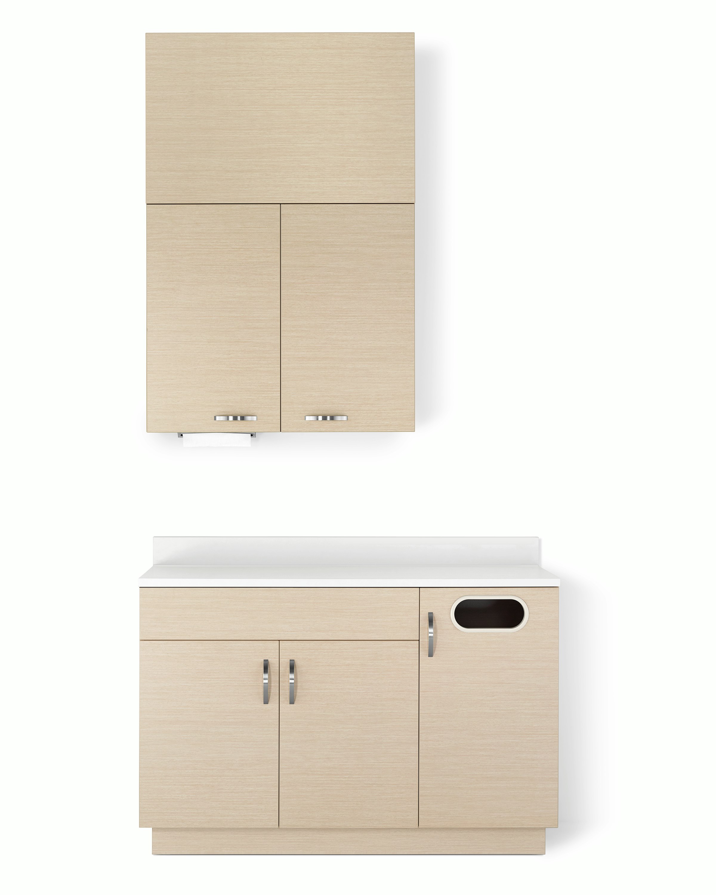Mora casework in an ash wood finish with a lower cabinet with double doors and a trash cabinet and white solid surface top, along with an upper storage unit with double doors and a soffit above.
