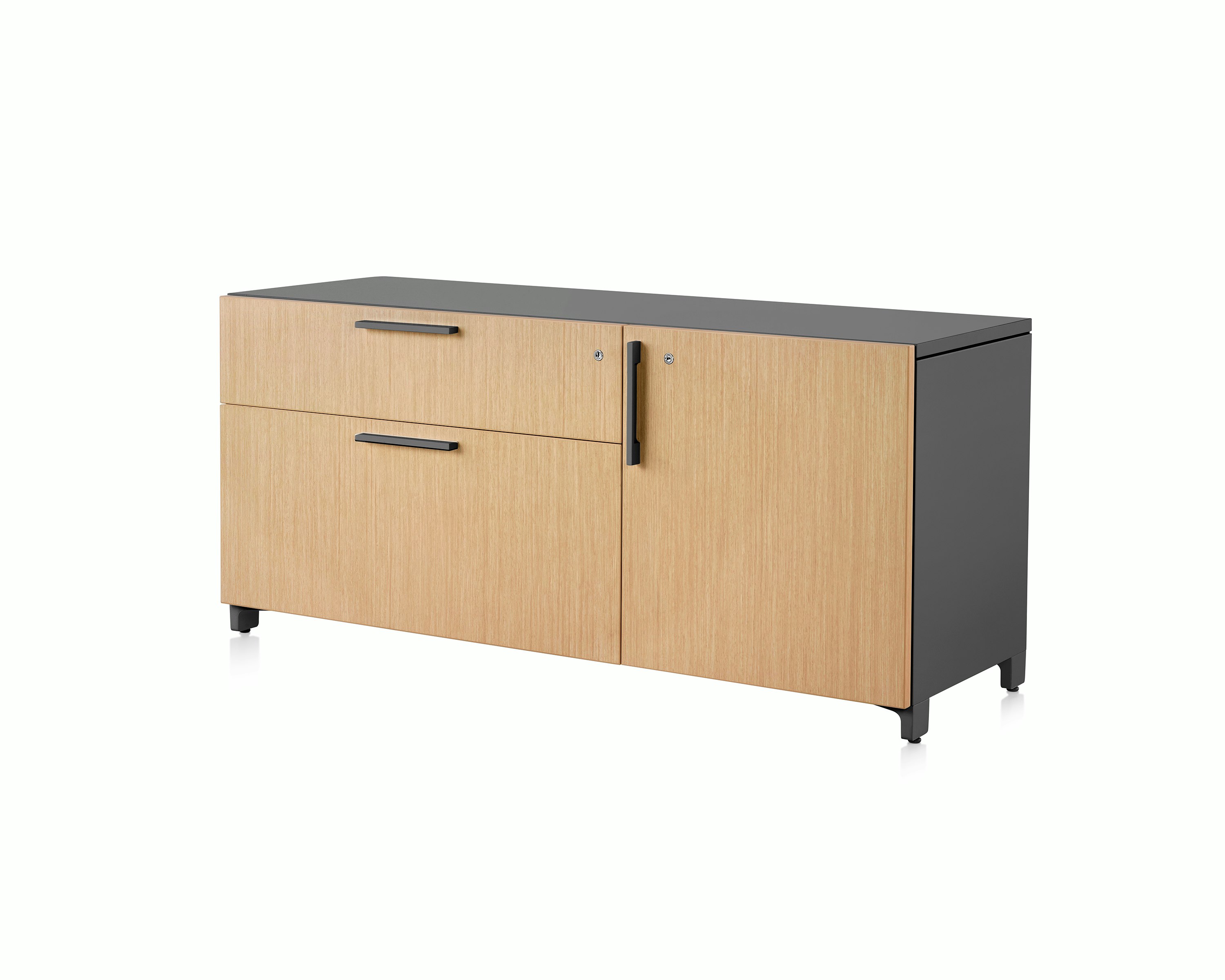 Brown and black Tu Wood individual credenza with two box drawers and door, viewed at an angle.